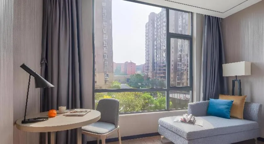 Bed in Echarm Hotel Zhuzhou Liling