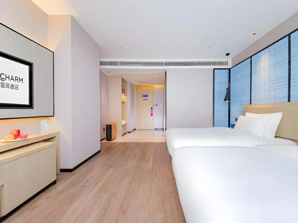Bed in Echarm Hotel Wuhan Hankou Railway Station Zhuyeshan Metro Station