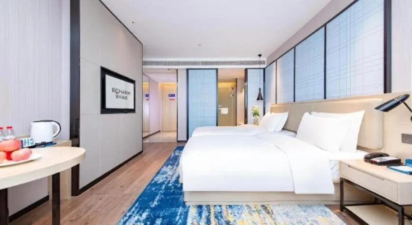 Bed in Echarm Hotel Wuhan Hankou Railway Station Zhuyeshan Metro Station