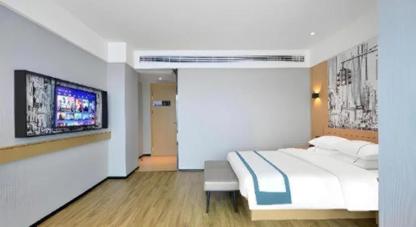 Bed in City Comfort Inn Yichang Sanxia Airport