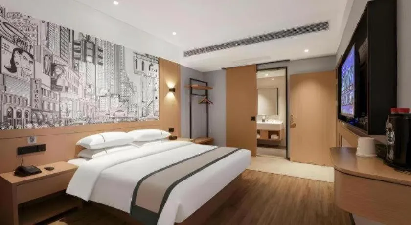 Bed in City Comfort Inn Yichang Sanxia Airport