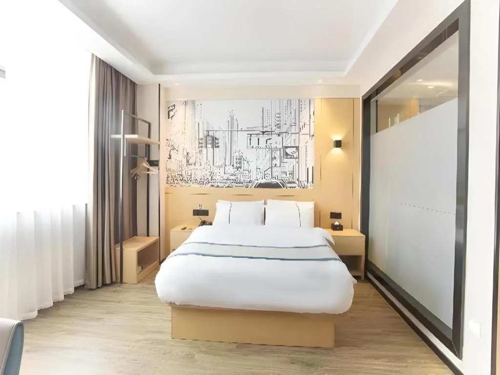 Bed in City Comfort Inn Jiujiang Gongqing Science and Technology College High-speed Railway Station