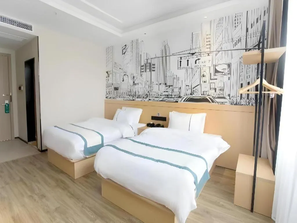 Bed in City Comfort Inn Jiujiang Gongqing Science and Technology College High-speed Railway Station