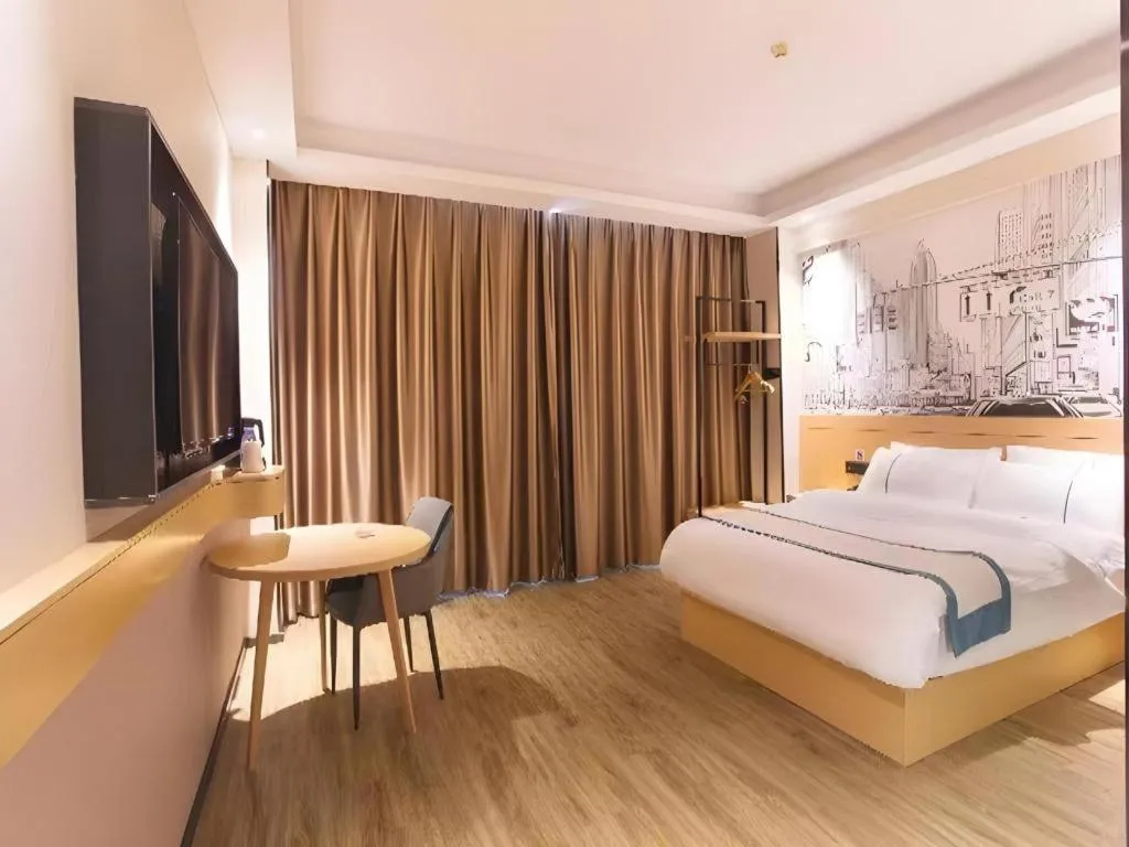 Bed in City Comfort Inn Jiujiang Gongqing Science and Technology College High-speed Railway Station