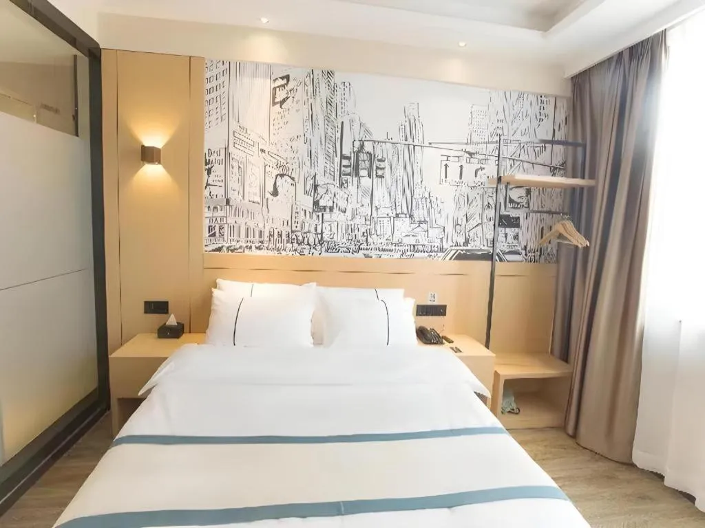 Bed in City Comfort Inn Jiujiang Gongqing Science and Technology College High-speed Railway Station