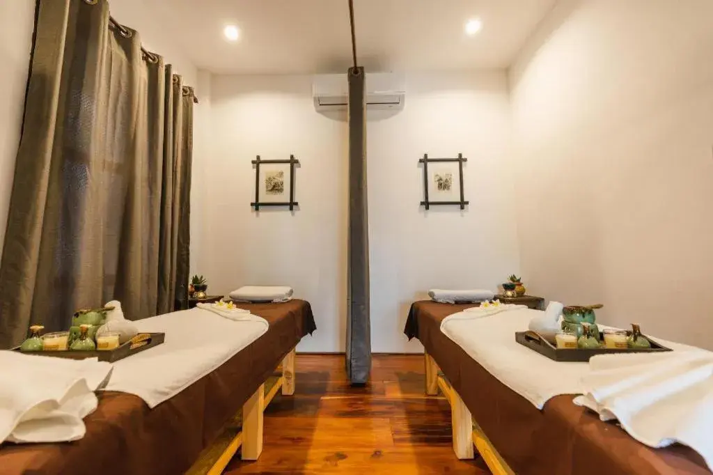 Bed in My BanLao Hotel Bed in My BanLao Hotel