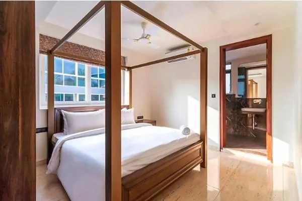 Bed in The Tanisi Resorts & Pool Villas, Candolim