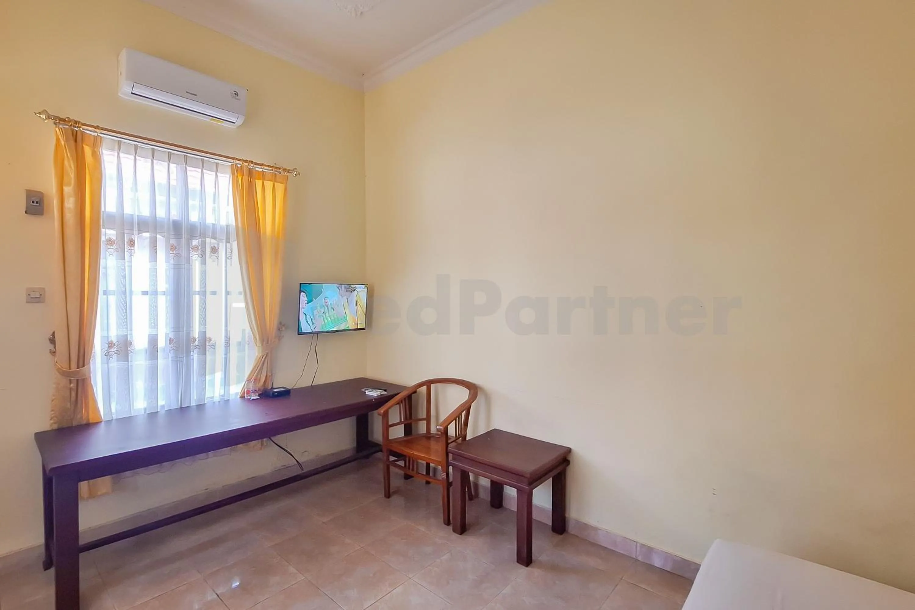 TV and multimedia in Aman Guest House Redpartner