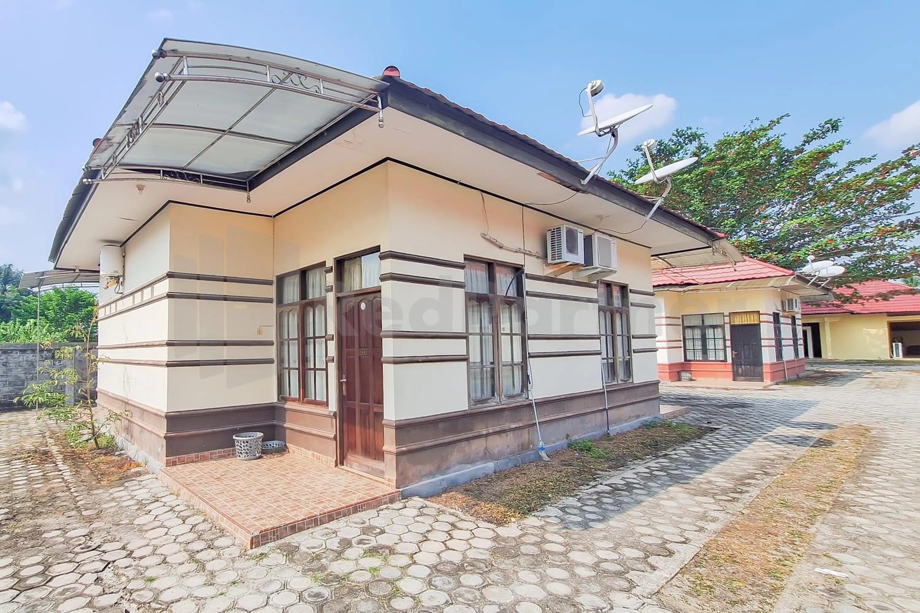 Property building in Aman Guest House Redpartner