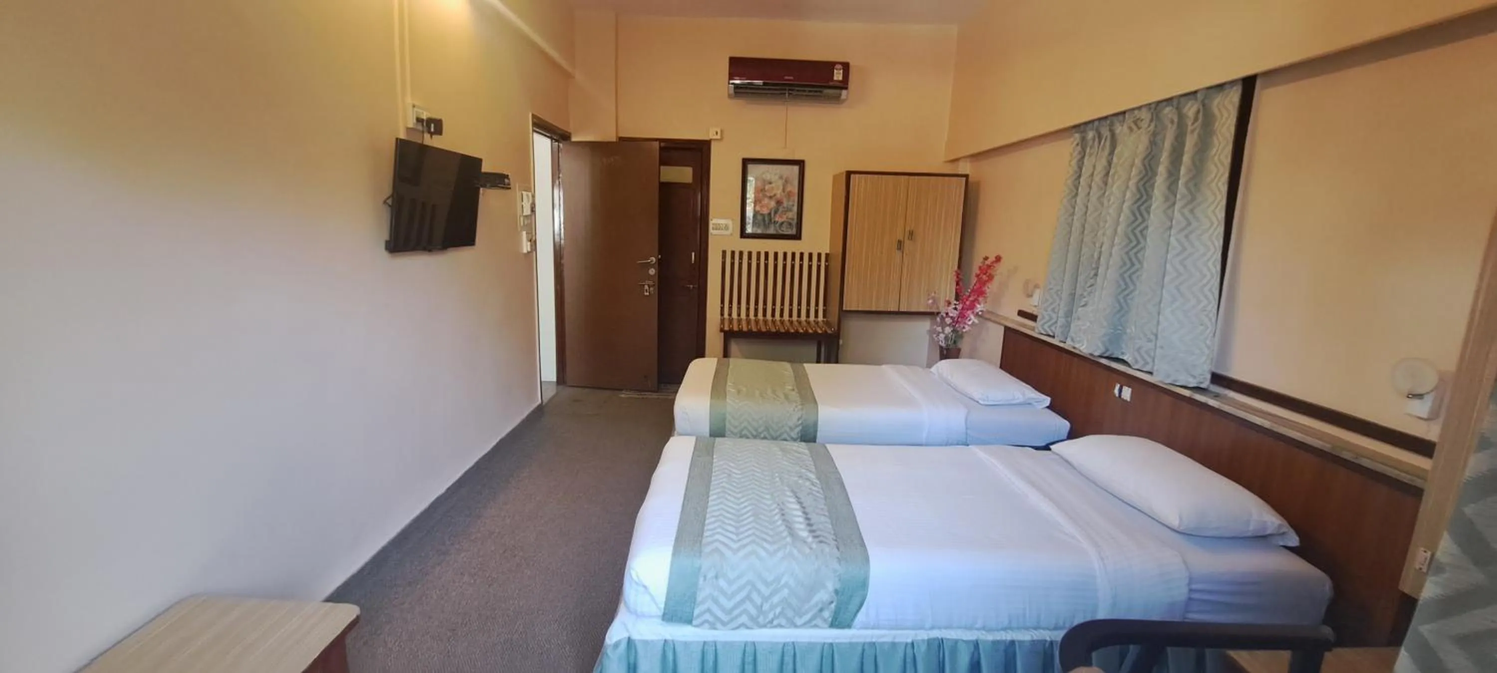 Bed in Hotel Swaroop