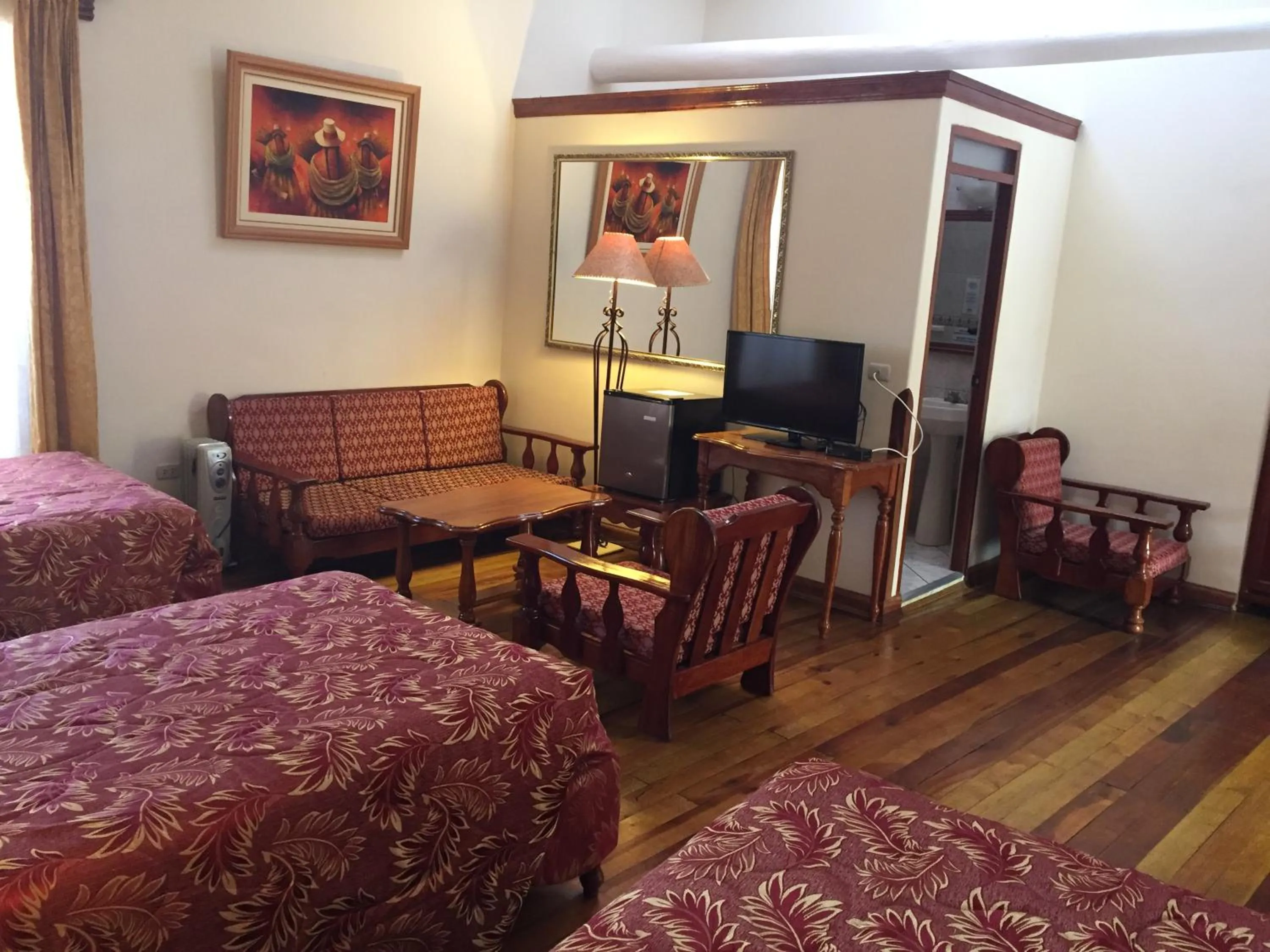 Communal lounge/ TV room, Bed in Hotel Midori