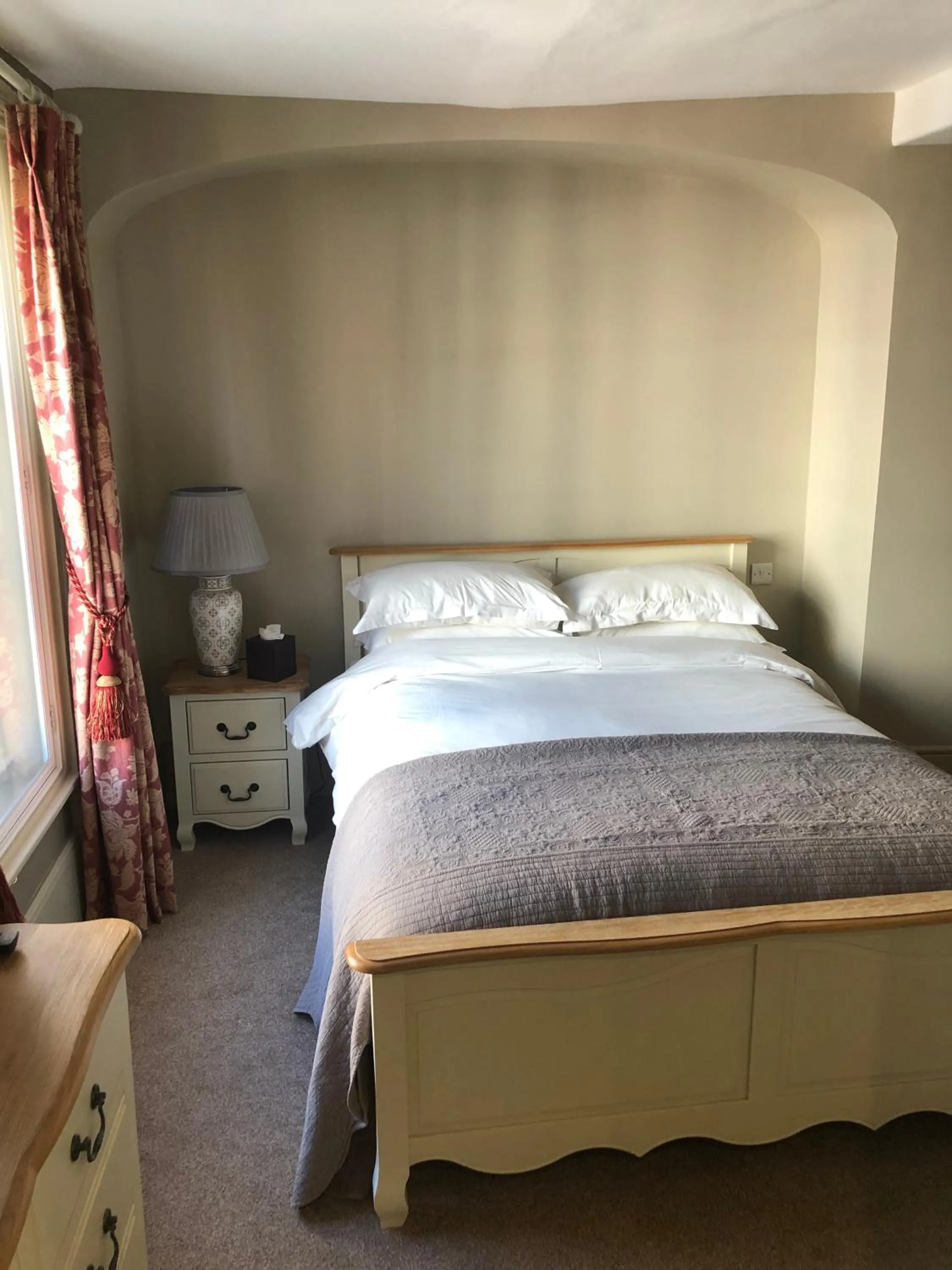 Bed in The Peppermill Town house Hotel & Restaurant