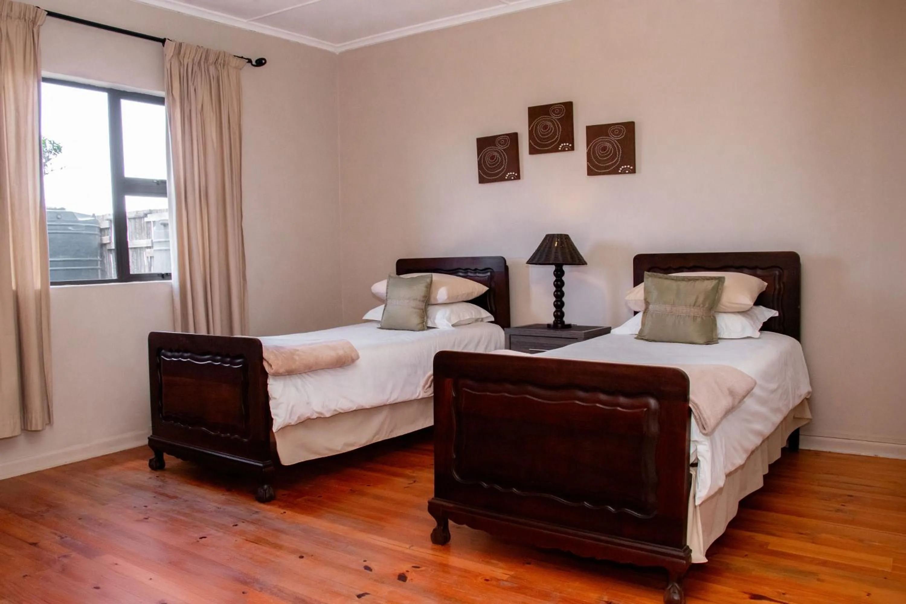 Bedroom, Bed in The Ranch House at African Safari Lodge
