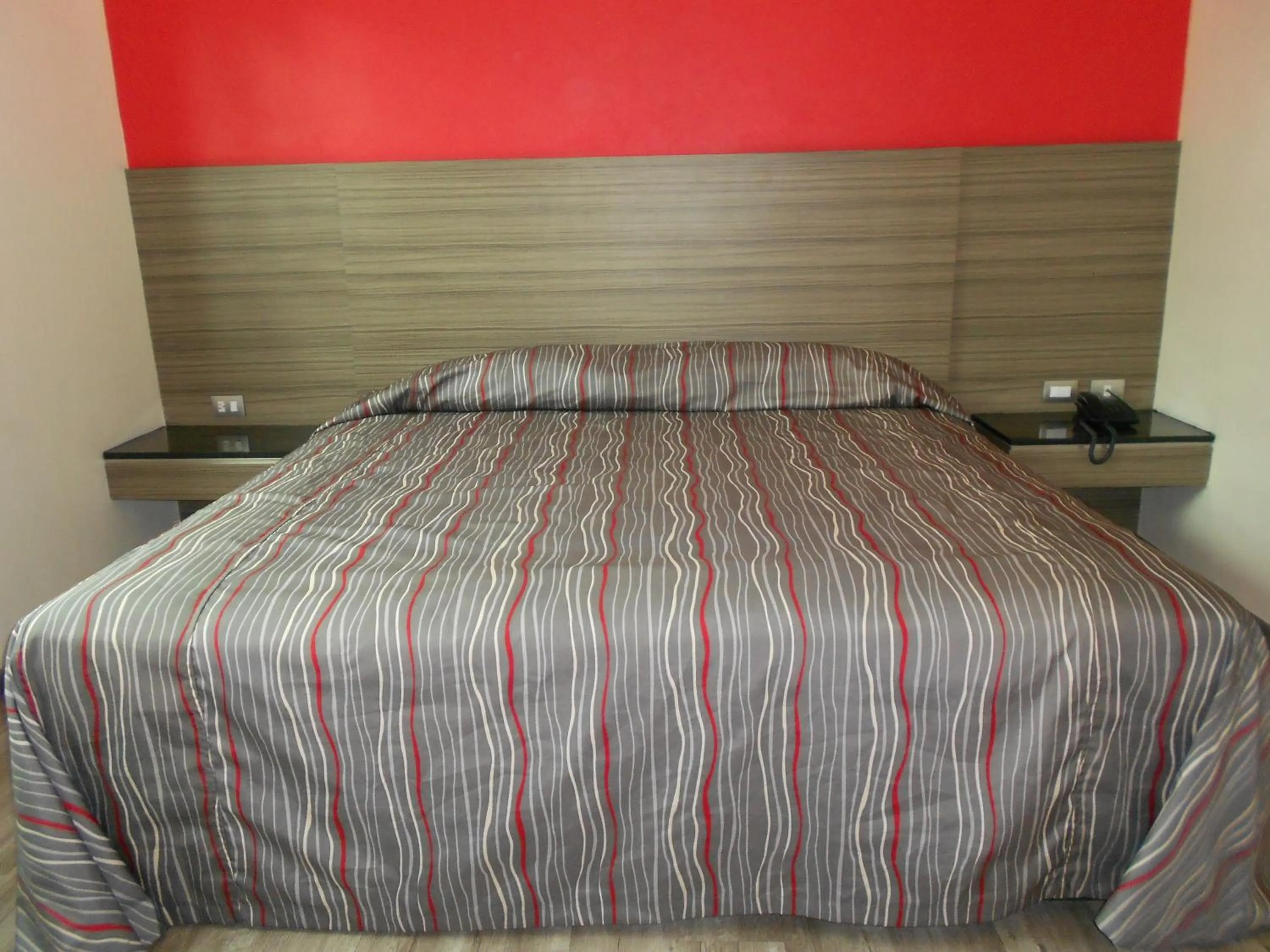 Bed in Hotel Dharma