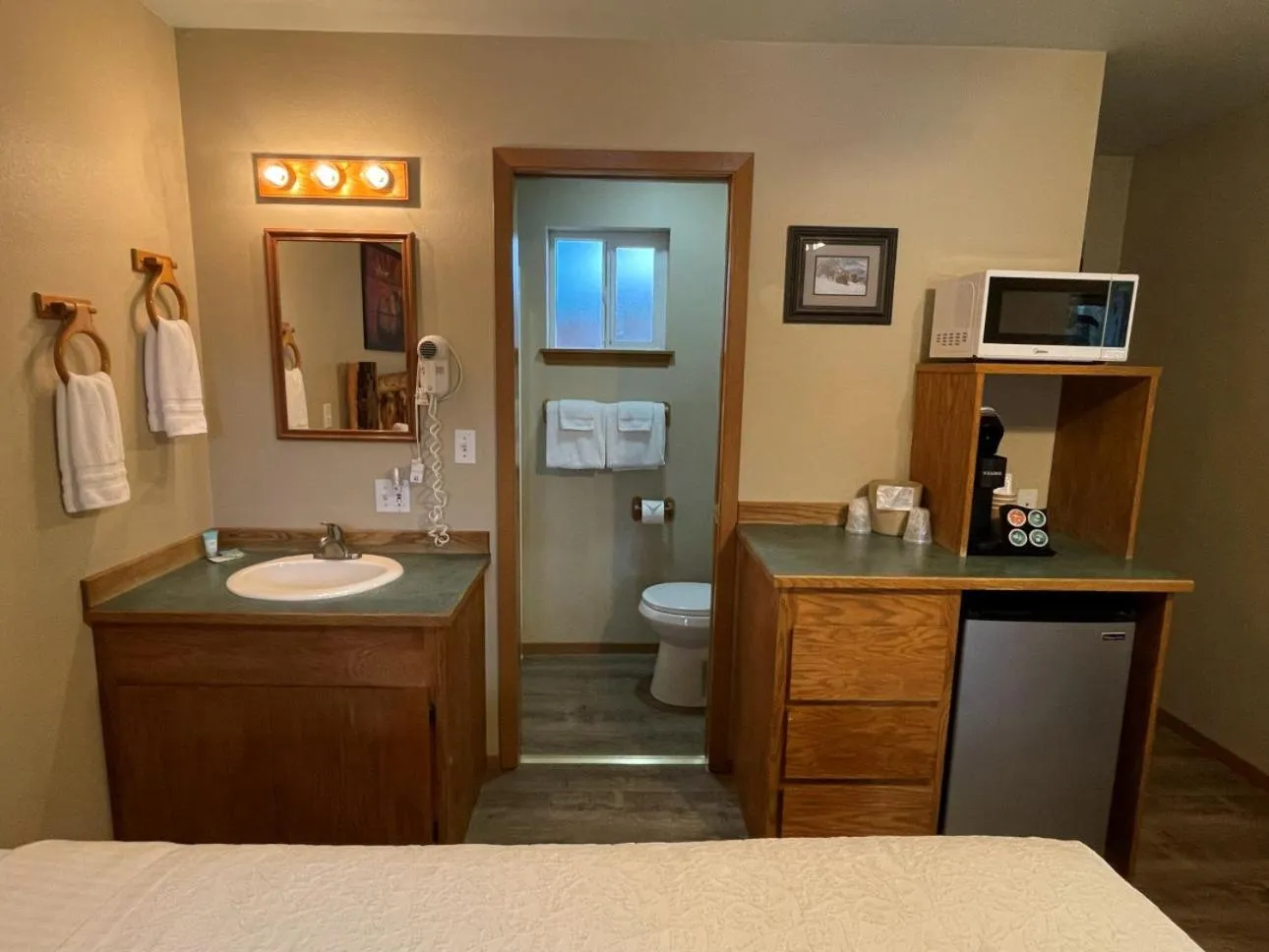 Toilet in Riverfront Motel & Cabins