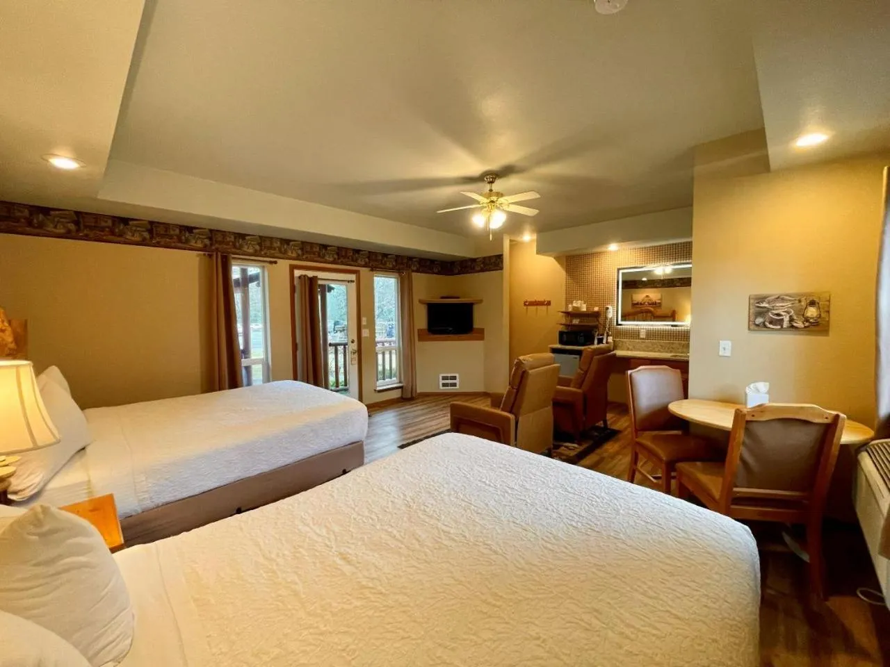 Bed in Riverfront Motel & Cabins