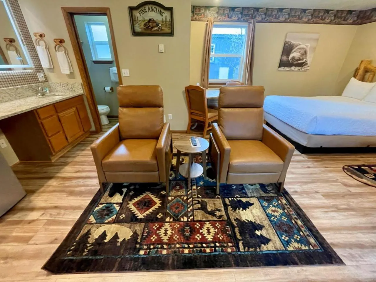 Bed in Riverfront Motel & Cabins