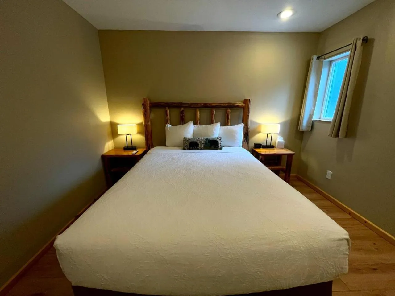 Bed in Riverfront Motel & Cabins