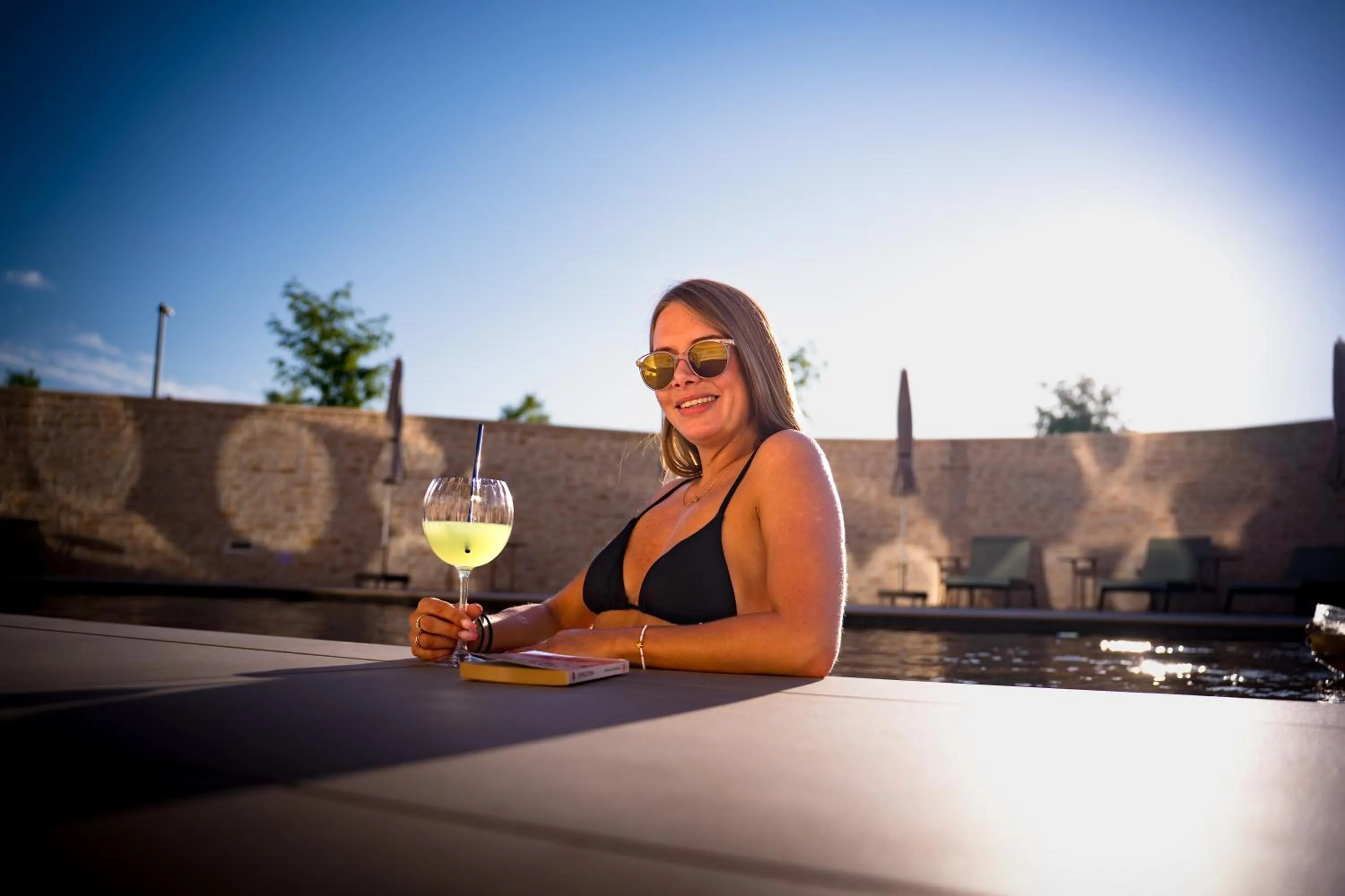 Swimming pool in Bô Hôtels Ambronay