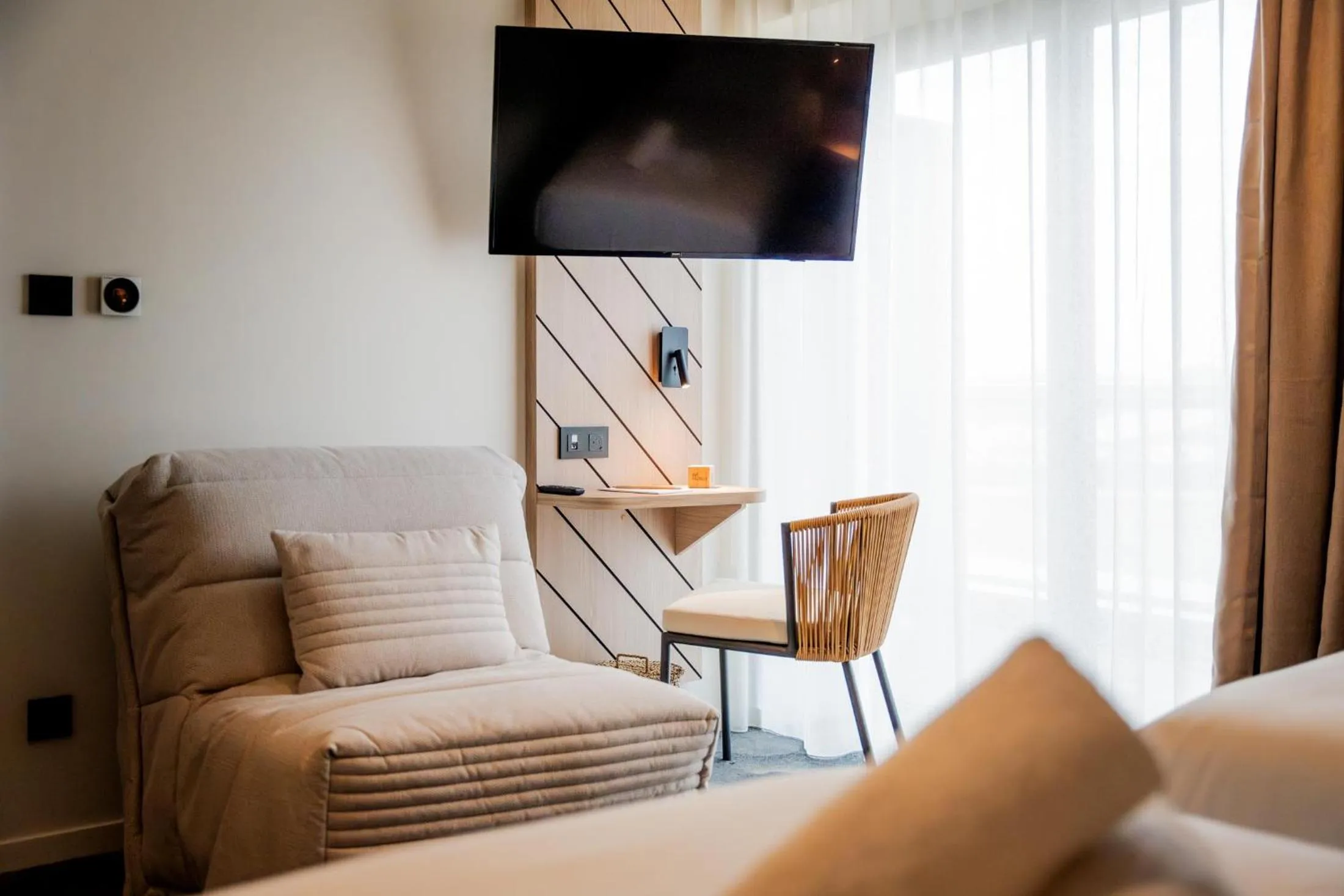 Bedroom in Bô Hôtels Ambronay