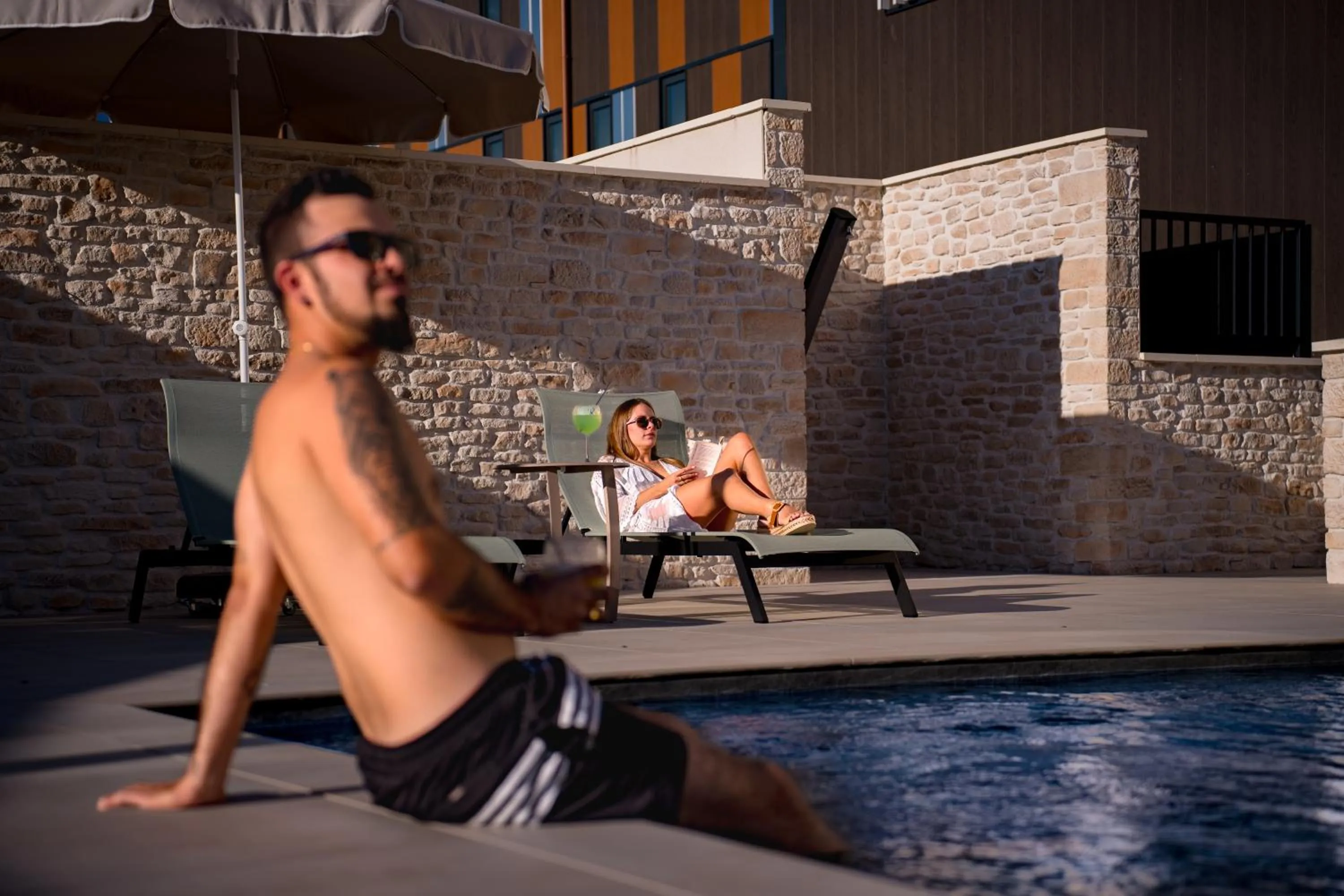 Swimming pool in Bô Hôtels Ambronay