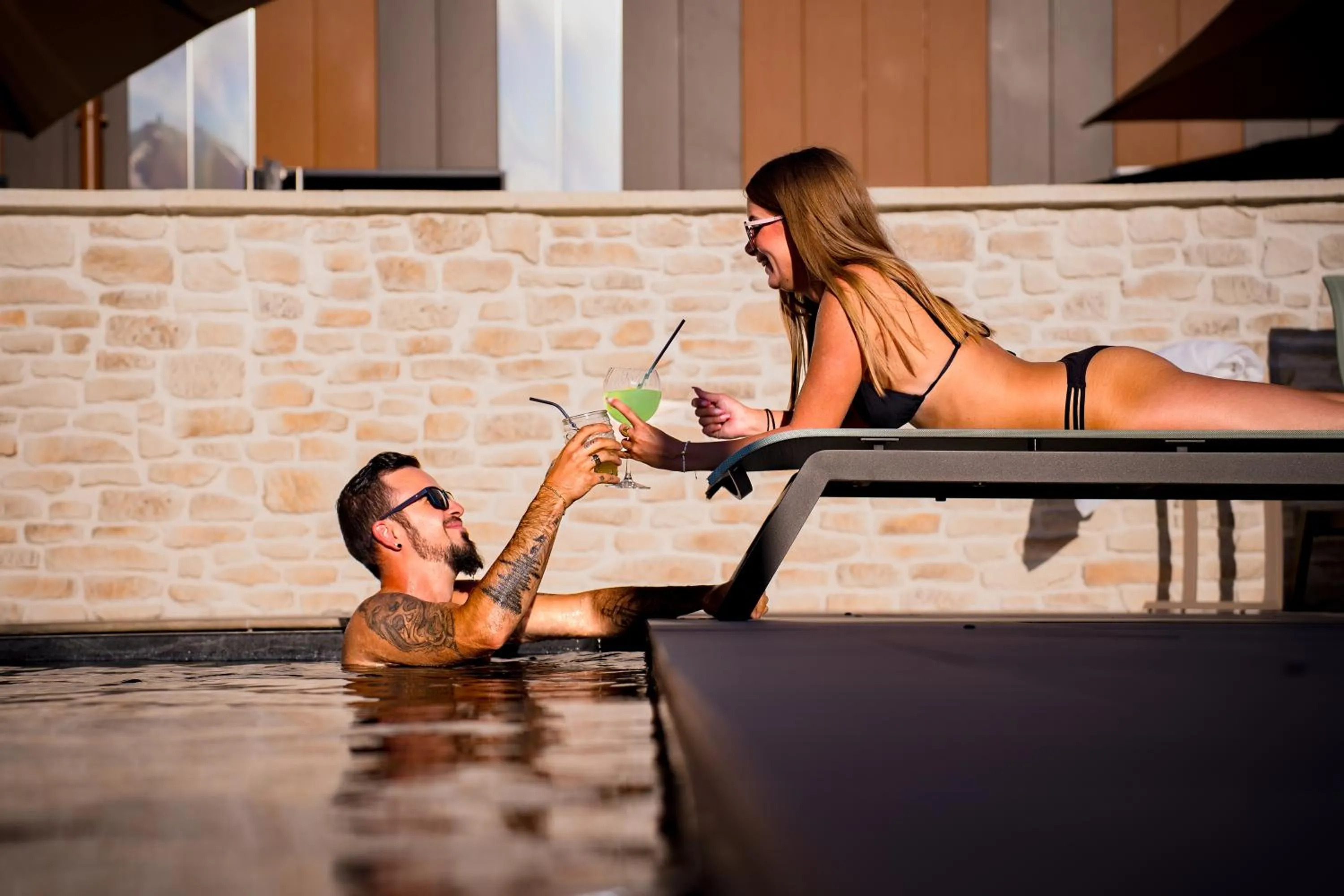 Swimming pool in Bô Hôtels Ambronay