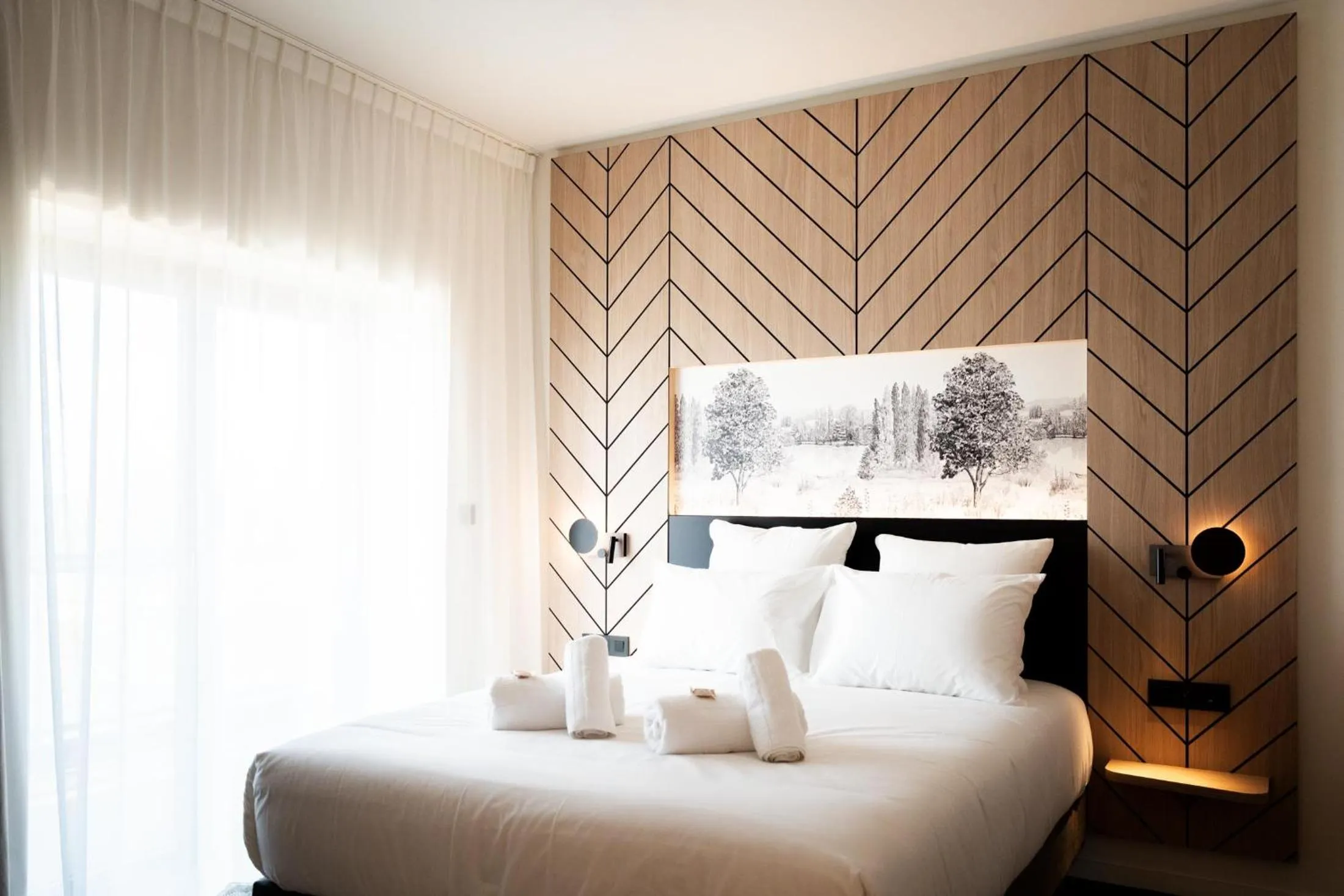 Bed in Bô Hôtels Ambronay