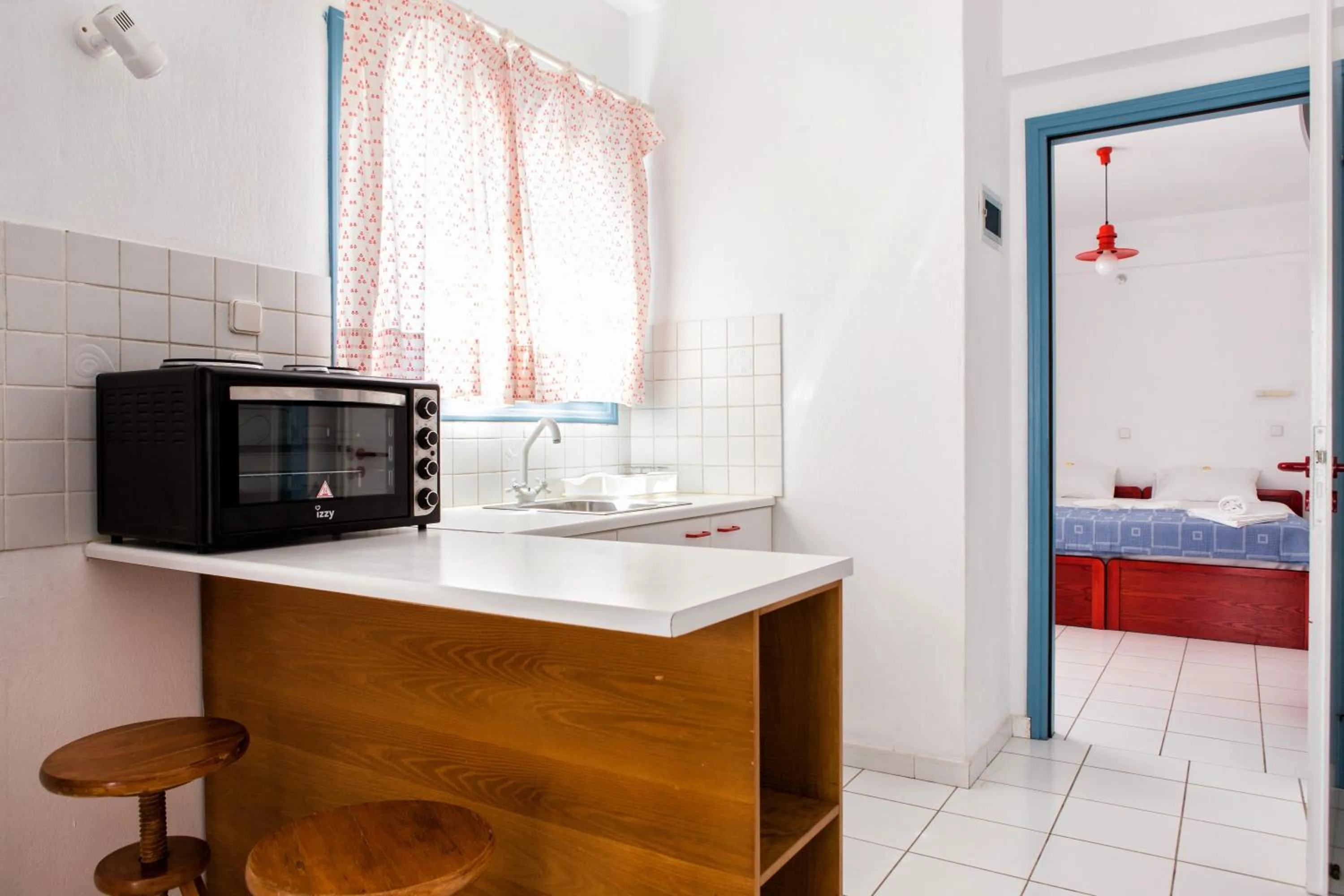 Kitchen or kitchenette, Bed in Fivos Apartments