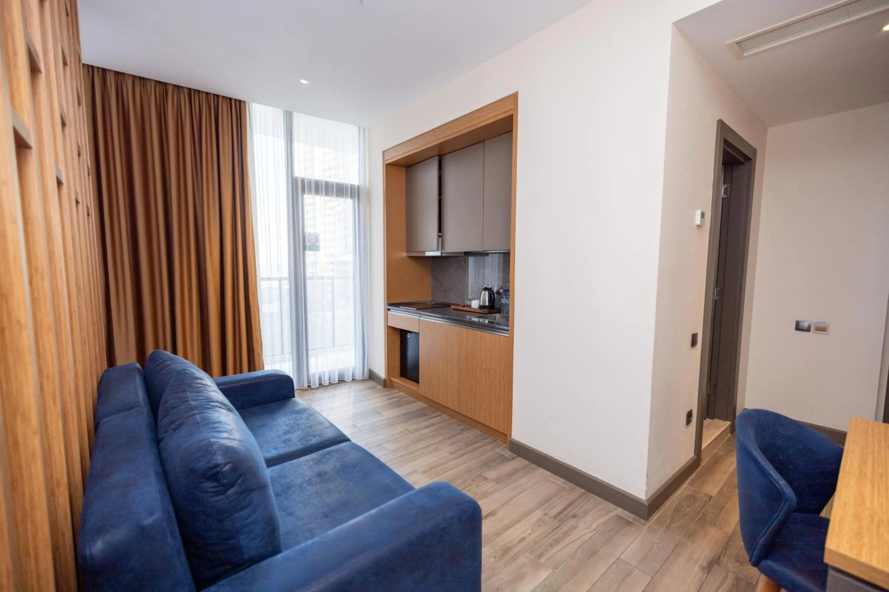 Living room in New Wave Apart-Hotel