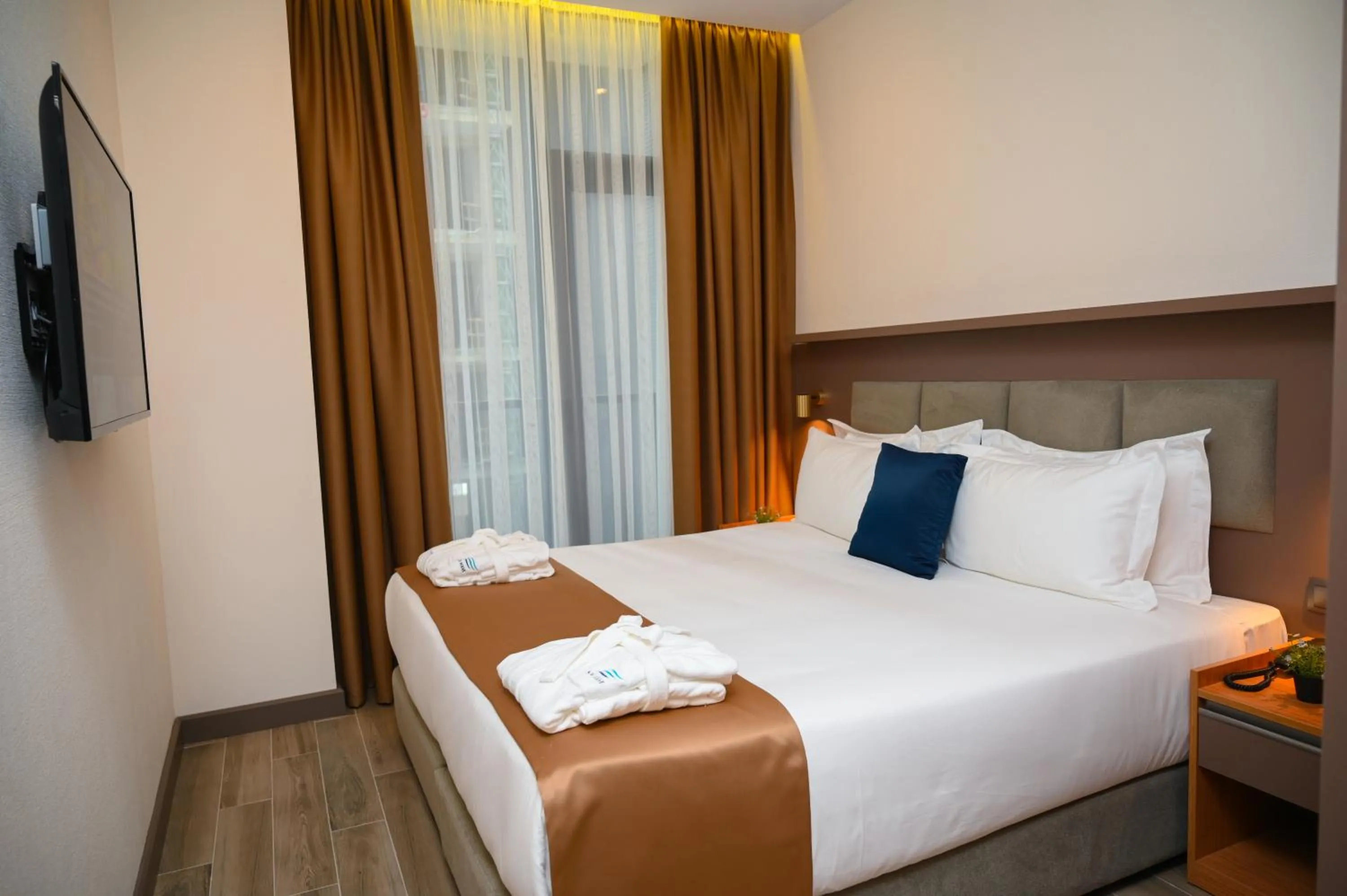 City view, Bed in New Wave Apart-Hotel