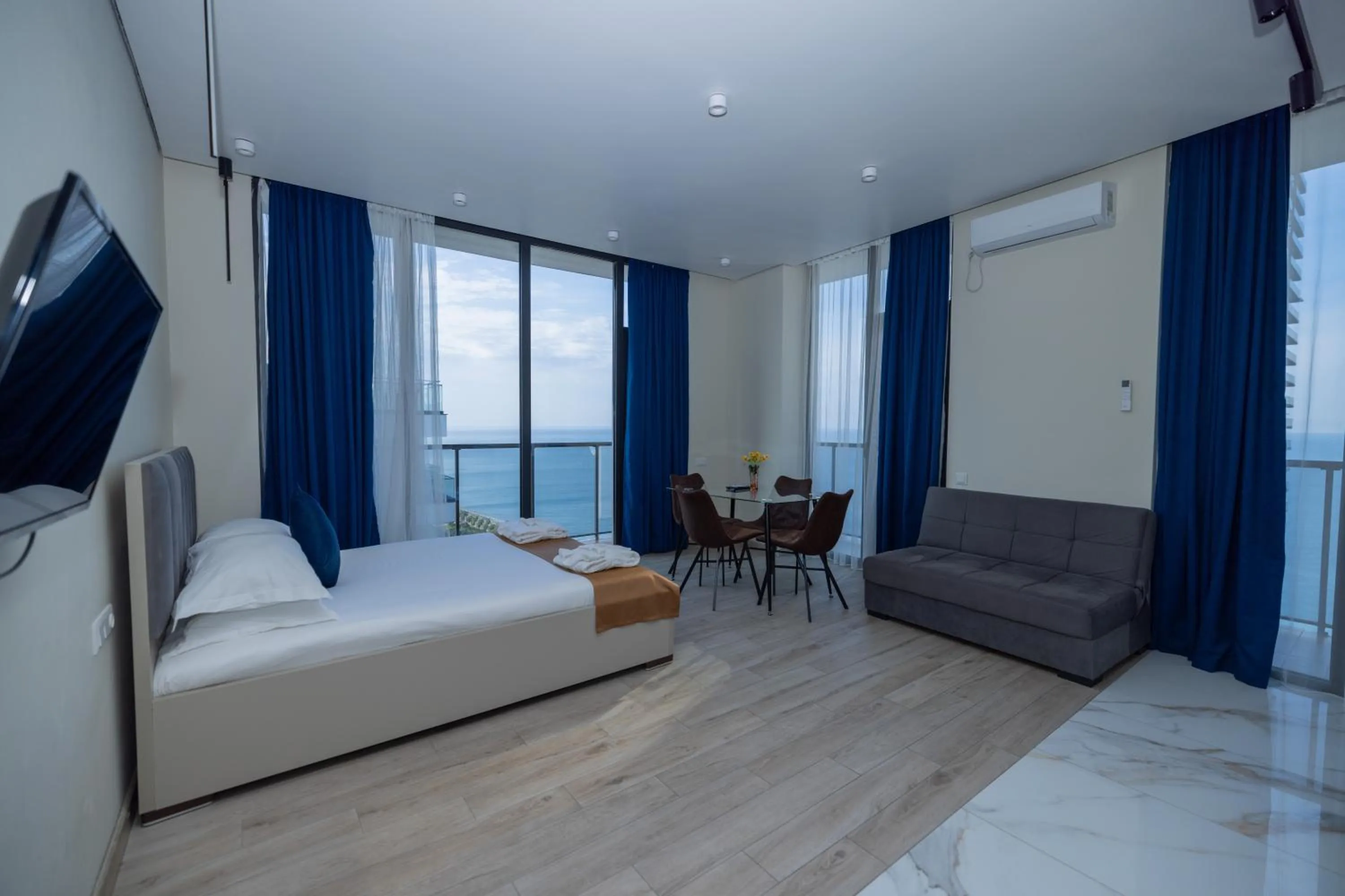 Property building, Bed in New Wave Apart-Hotel