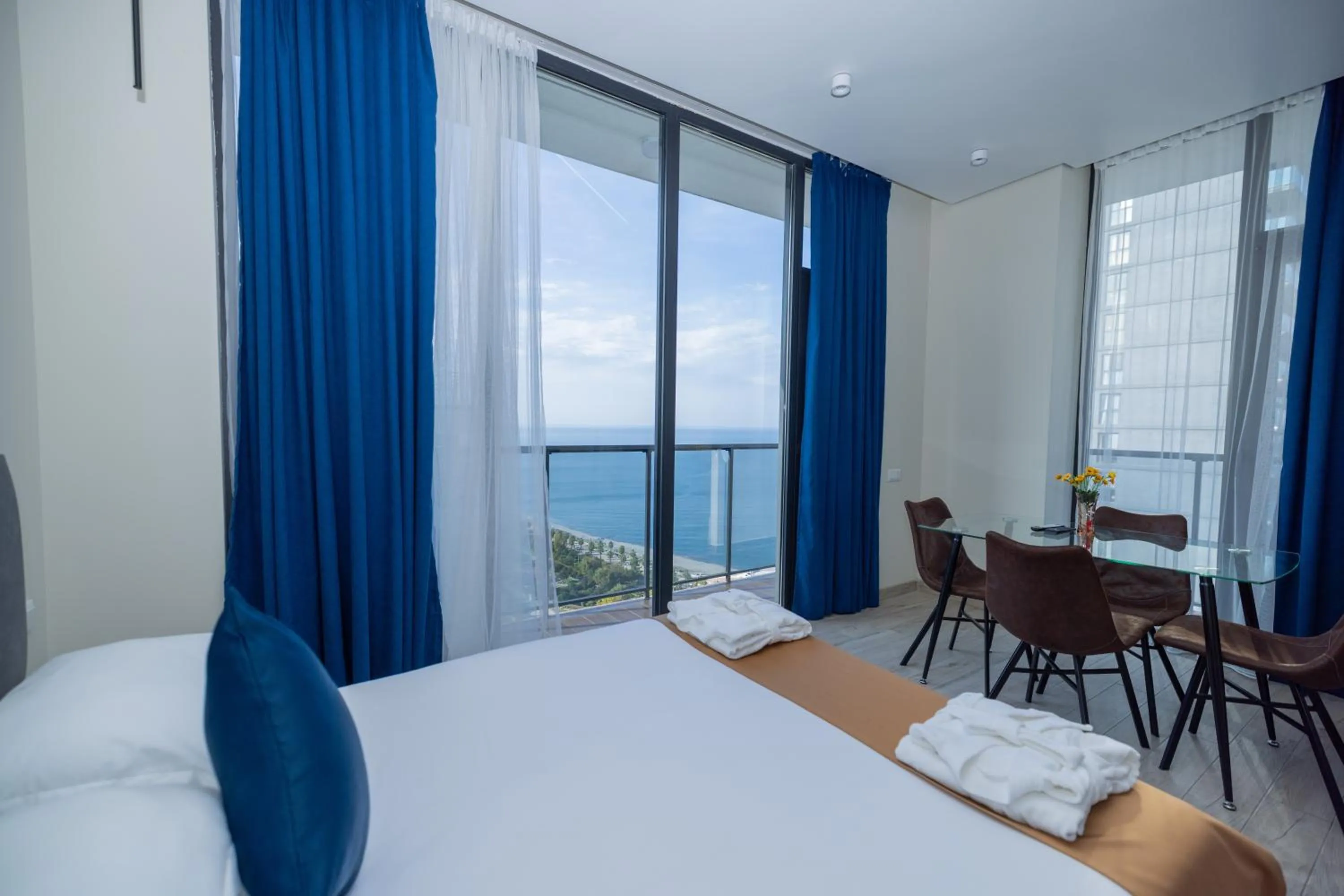 Property building, Bed in New Wave Apart-Hotel