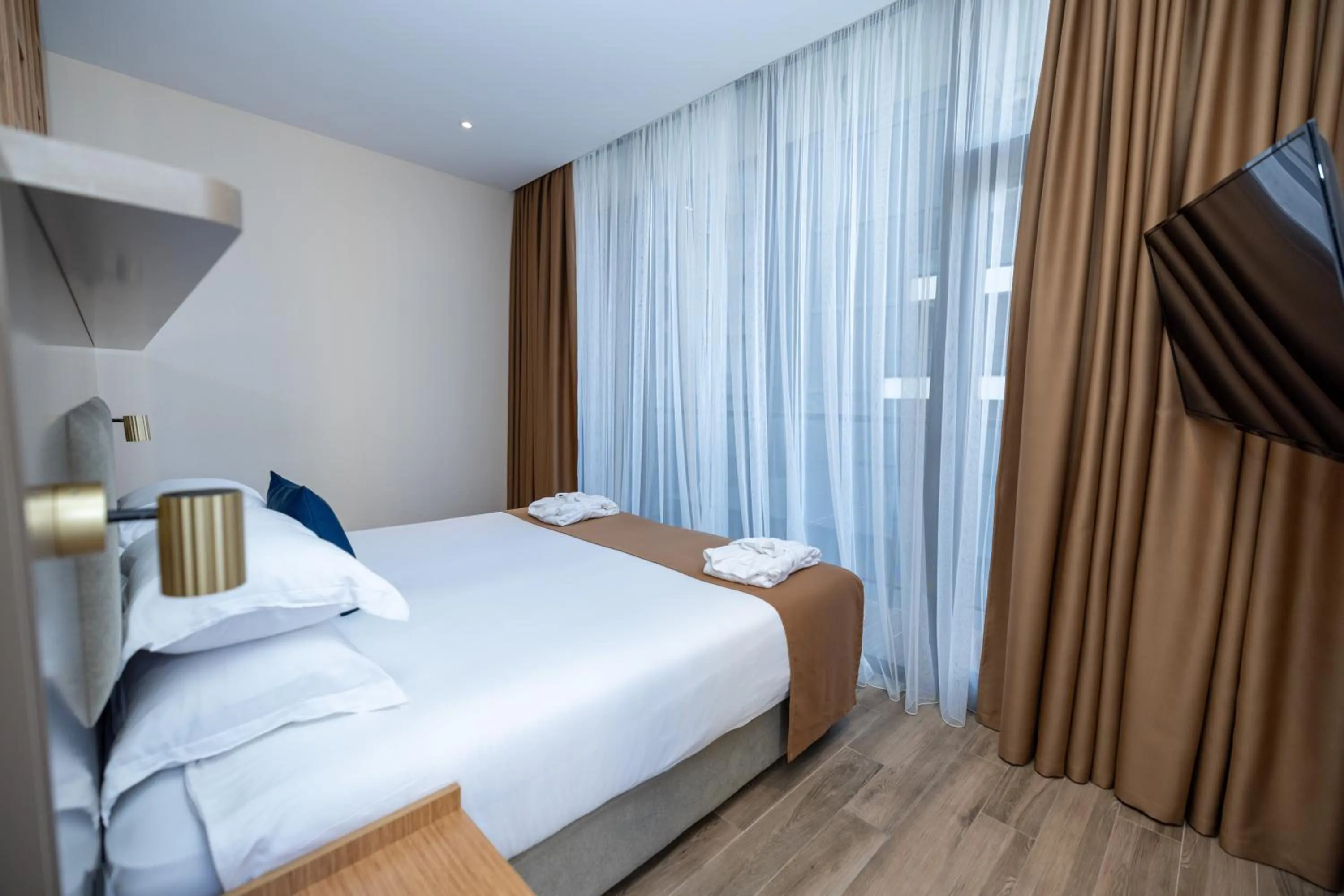 Photo of the whole room, Bed in New Wave Apart-Hotel