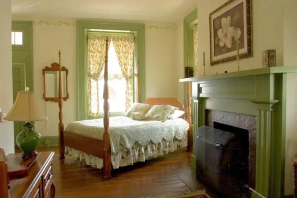 Bed in The Lafayette Inn & Restaurant