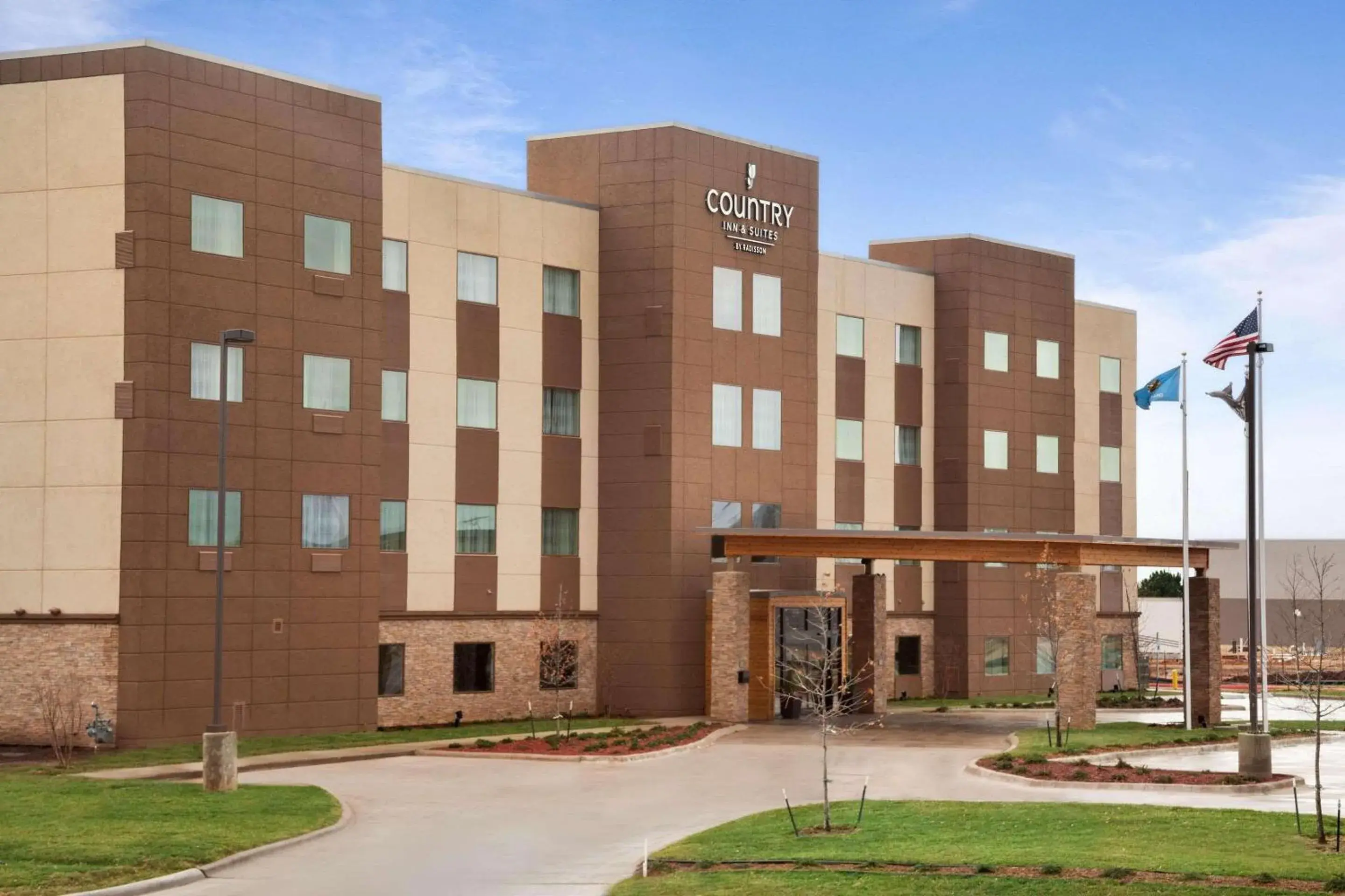 Property building in Country Inn & Suites by Radisson, Enid, OK Property building in Country Inn & Suites by Radisson, Enid, OK