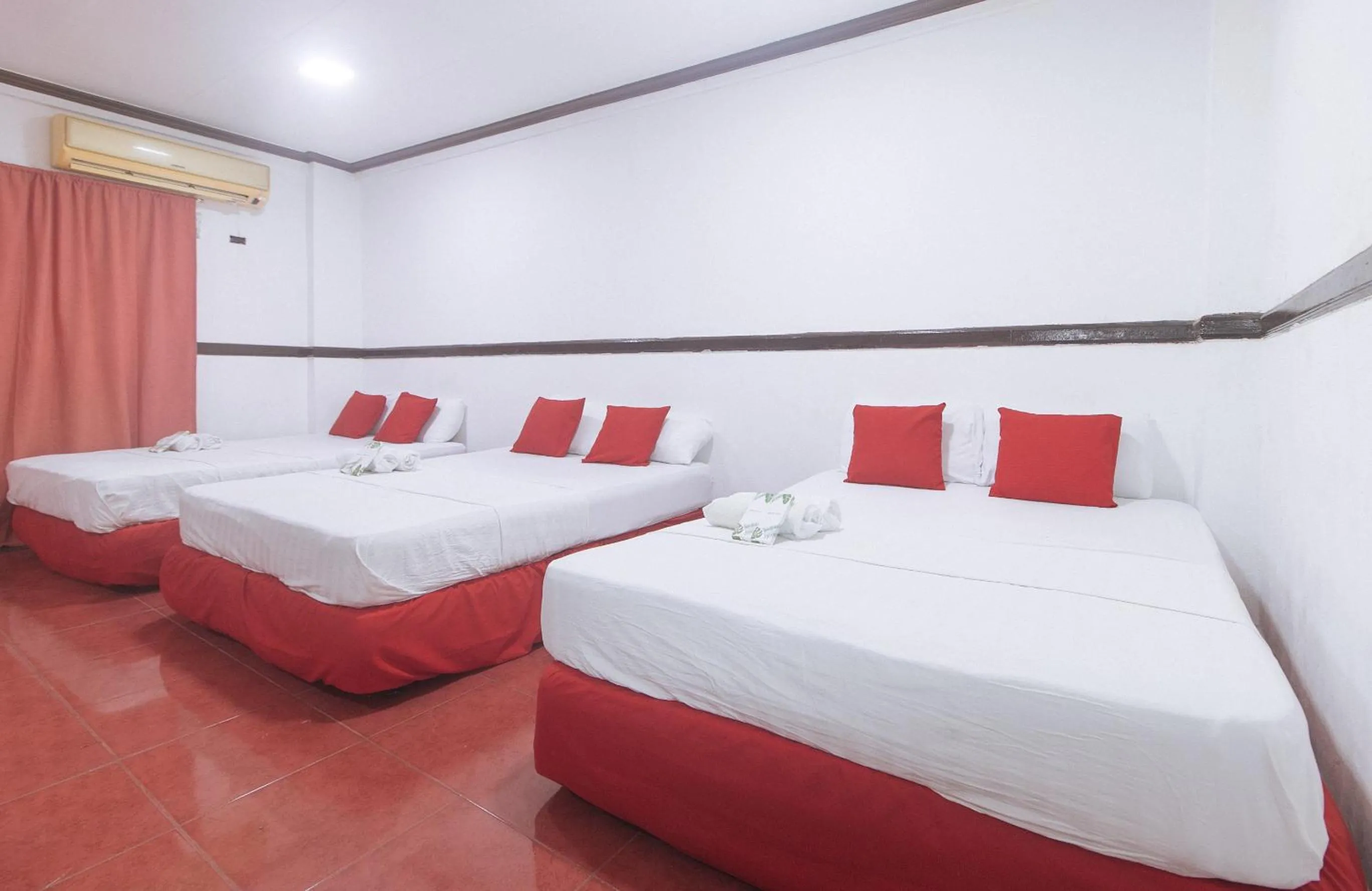 Family Room in Max Travellers Inn by RedDoorz
