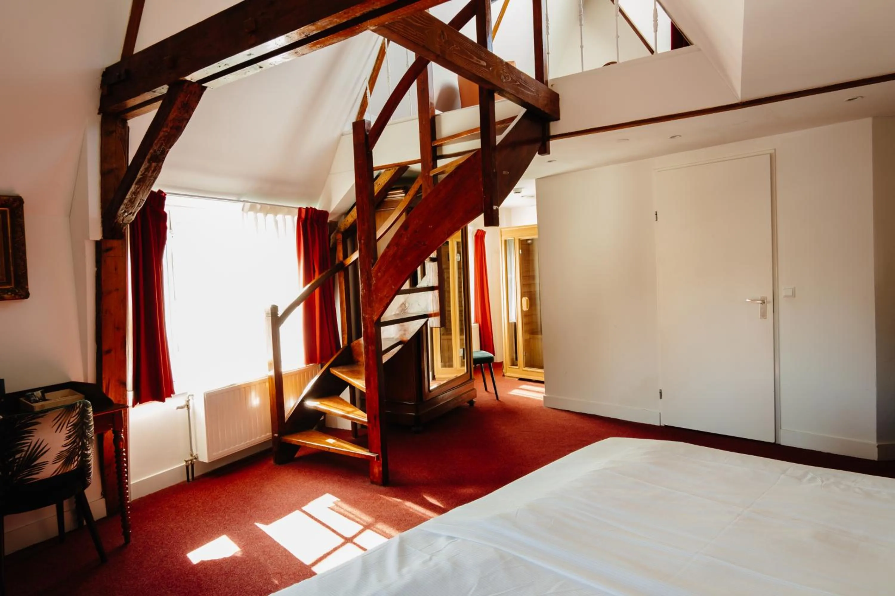 Bed in Ambassador City Centre Hotel