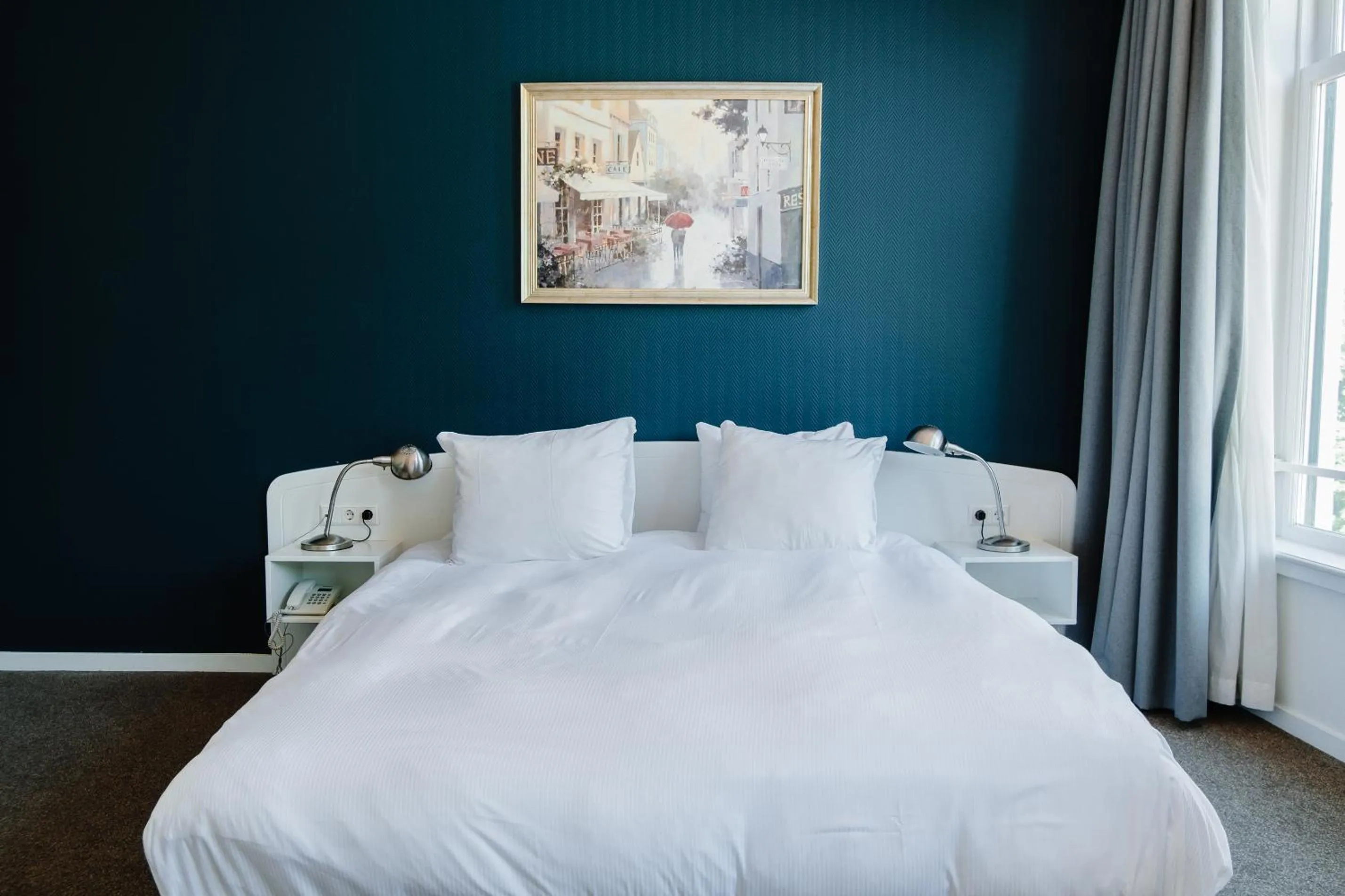 Bed in Ambassador City Centre Hotel