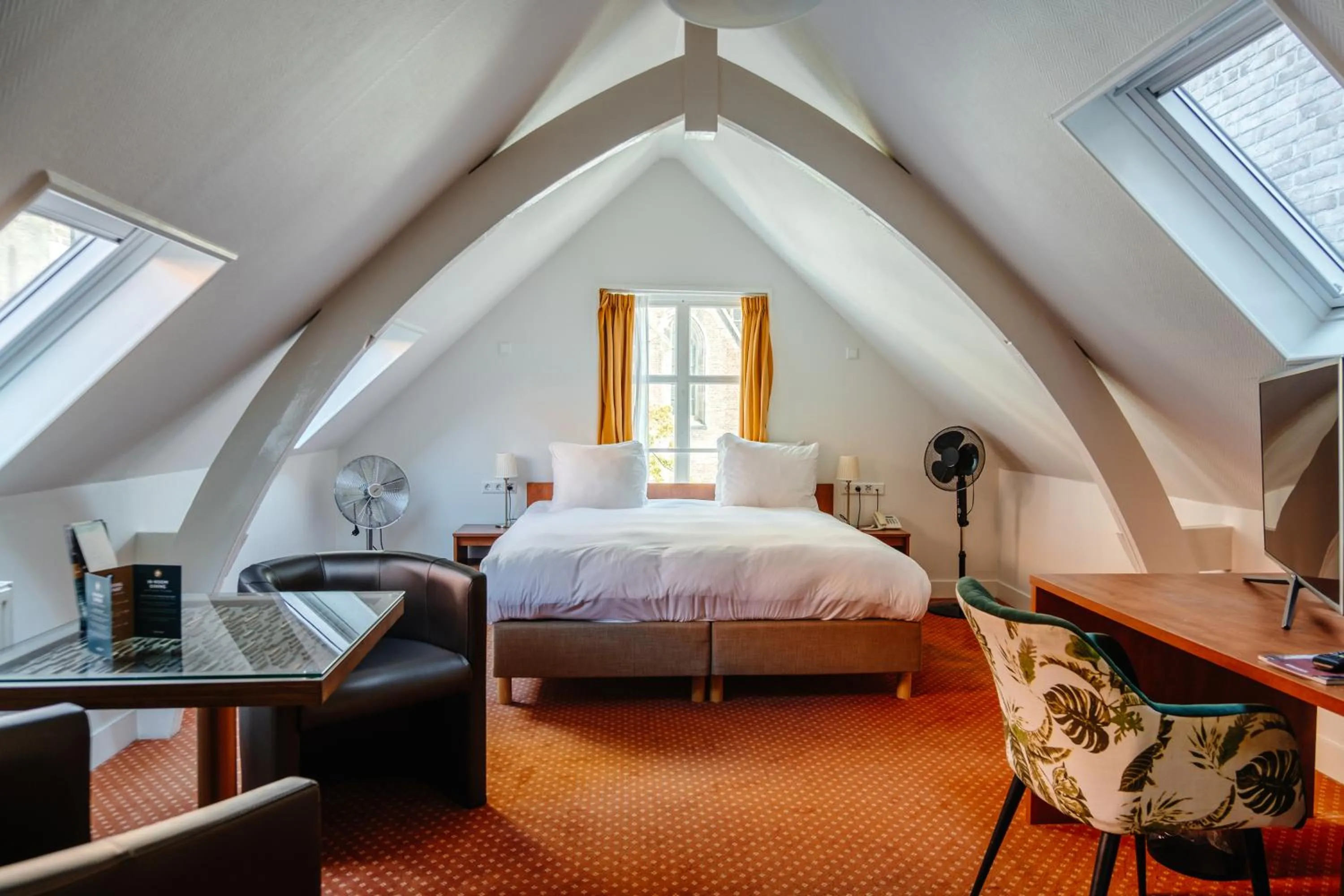 Bed in Ambassador City Centre Hotel