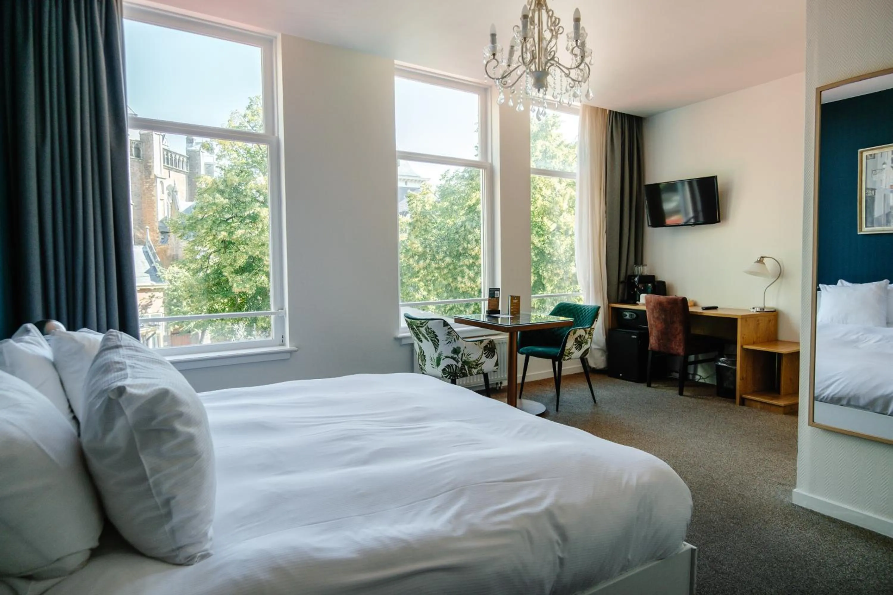 Bed in Ambassador City Centre Hotel