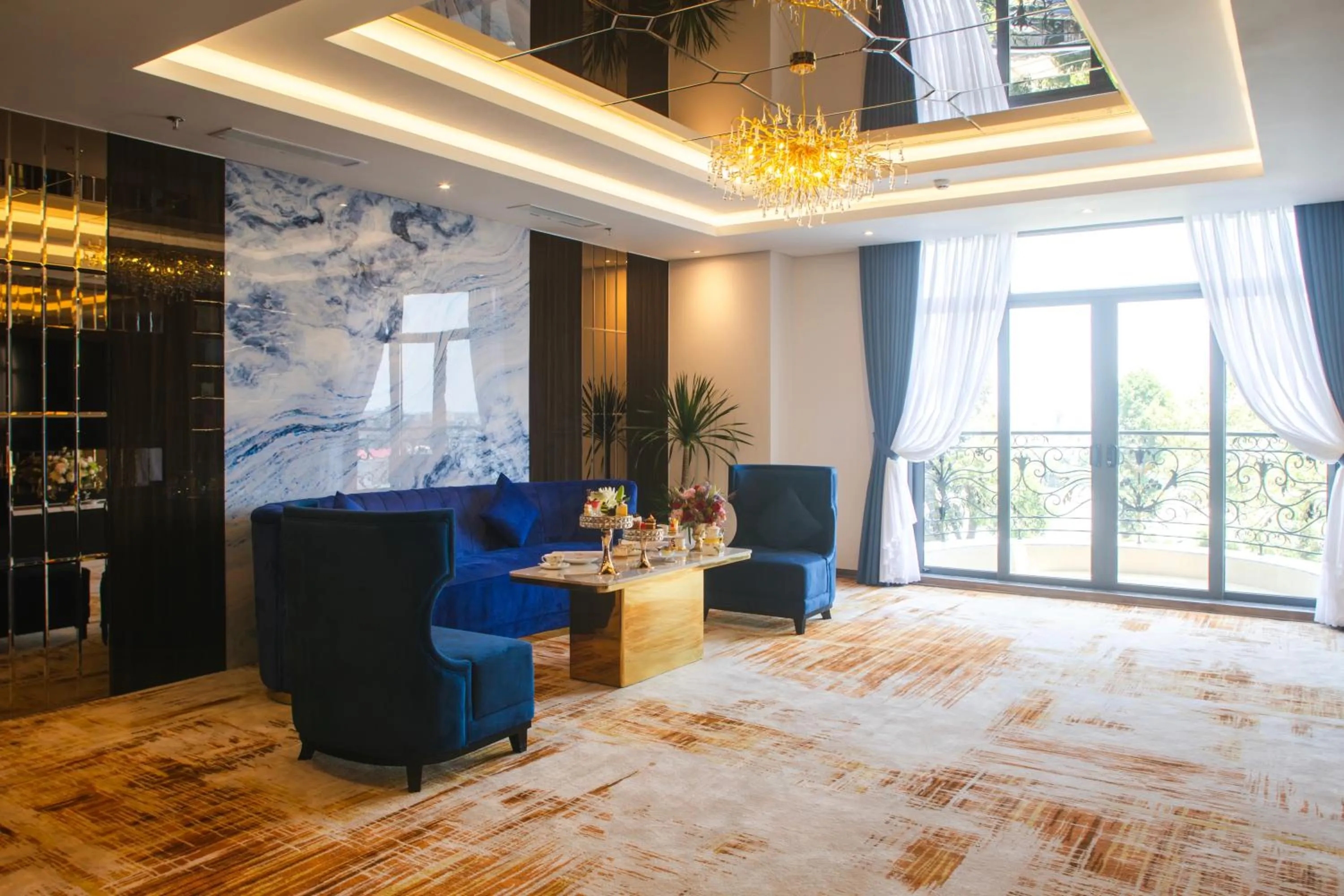 Living room in SANDALS AQUILA HOTEL