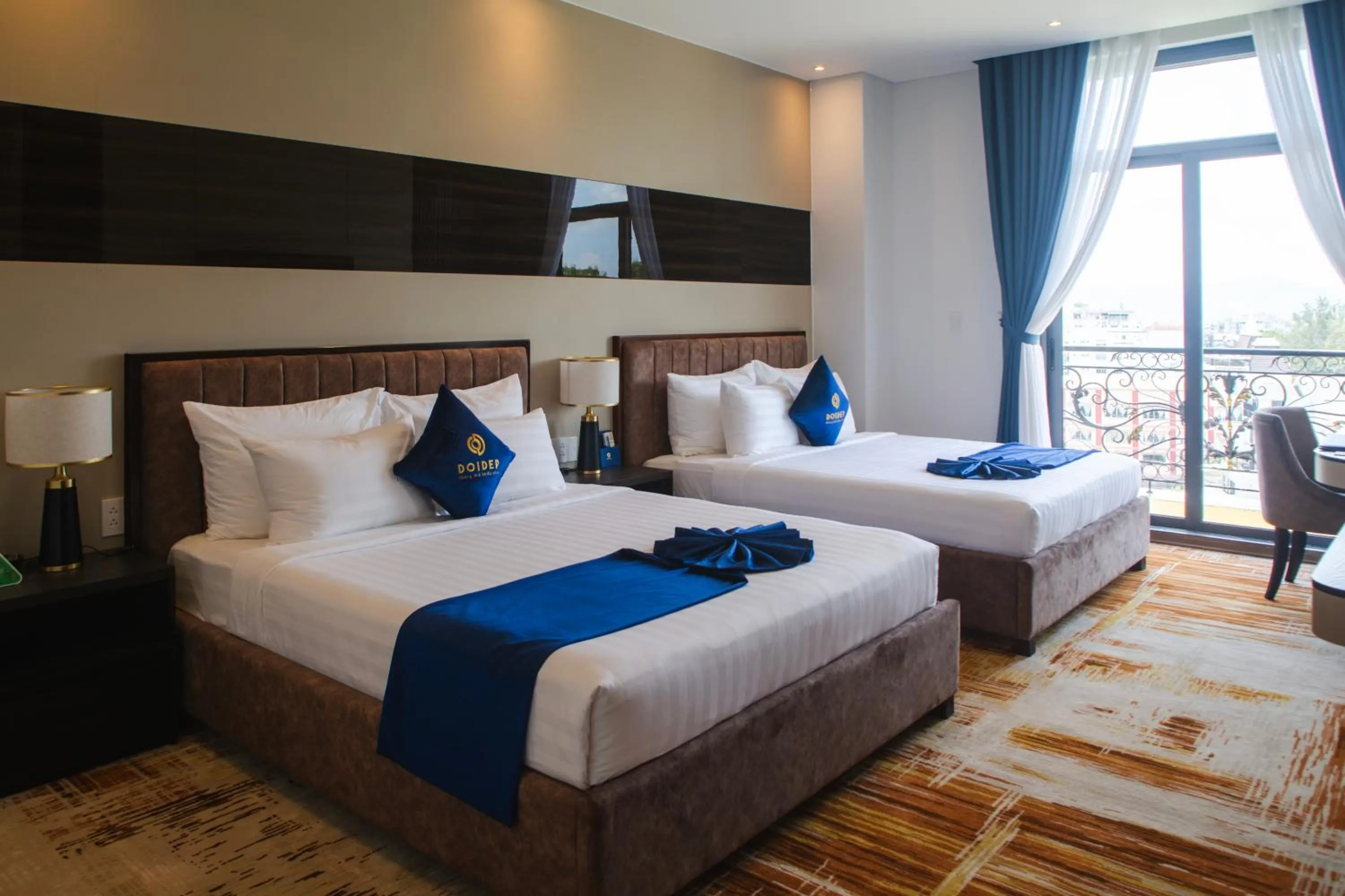 Bed in SANDALS AQUILA HOTEL