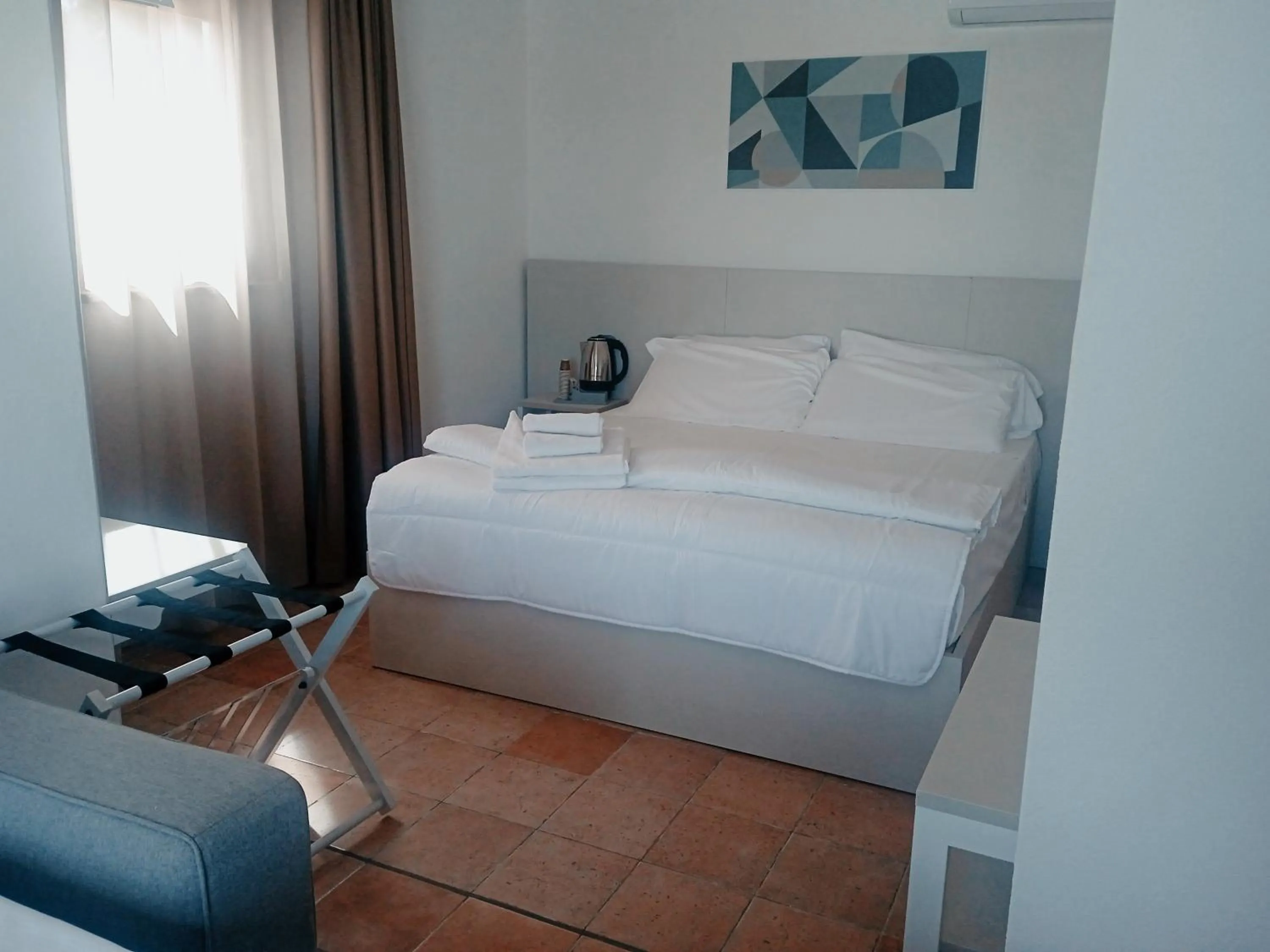 Photo of the whole room, Bed in Q Resort