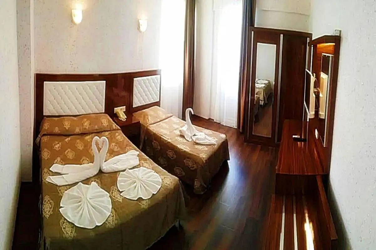 Bed in Club Bayar Beach Hotel