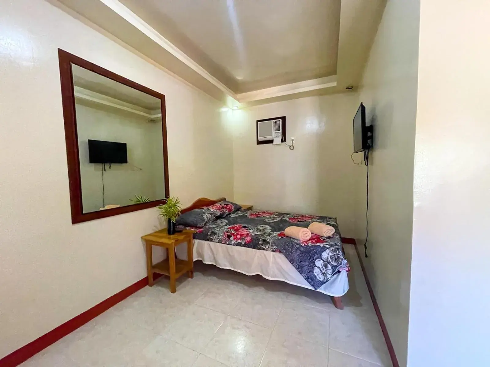 Bed in Delgados Resort Puerto Galera powered by Cocotel Bed in Delgados Resort Puerto Galera powered by Cocotel