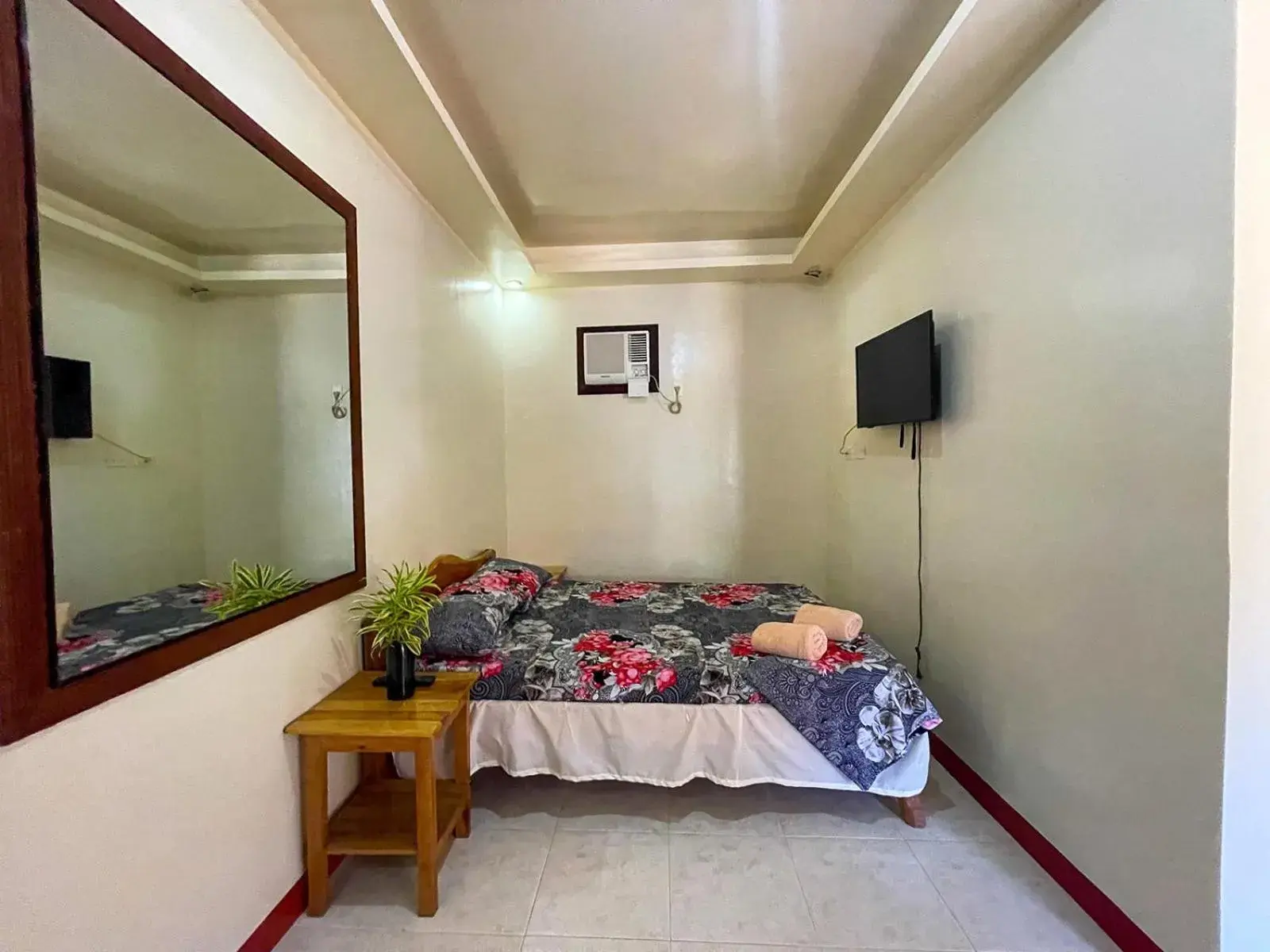 Bed in Delgados Resort Puerto Galera powered by Cocotel Bed in Delgados Resort Puerto Galera powered by Cocotel