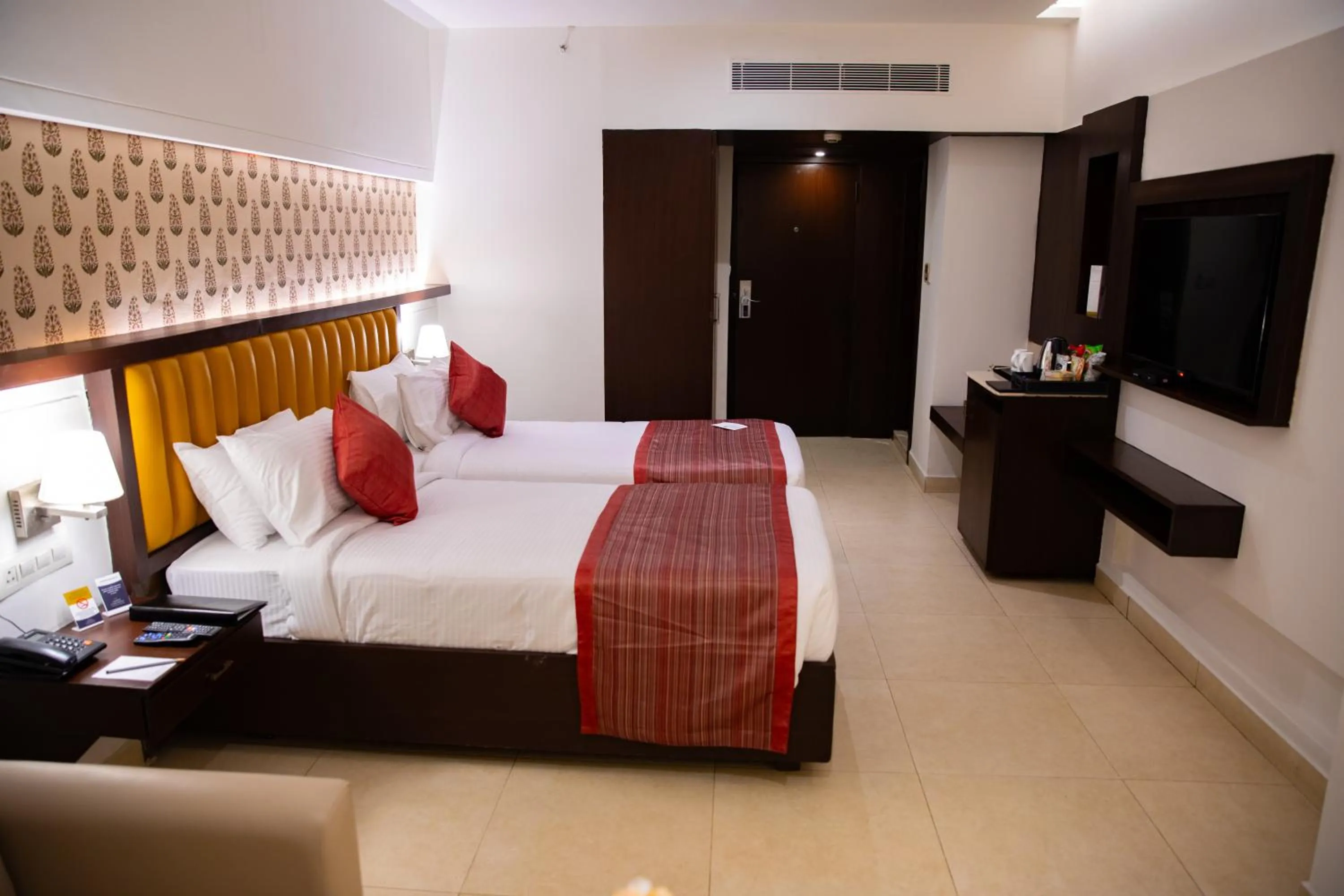 Bedroom, Bed in Grand Continent Secunderabad A Sarovar Portico Affiliate Hotel