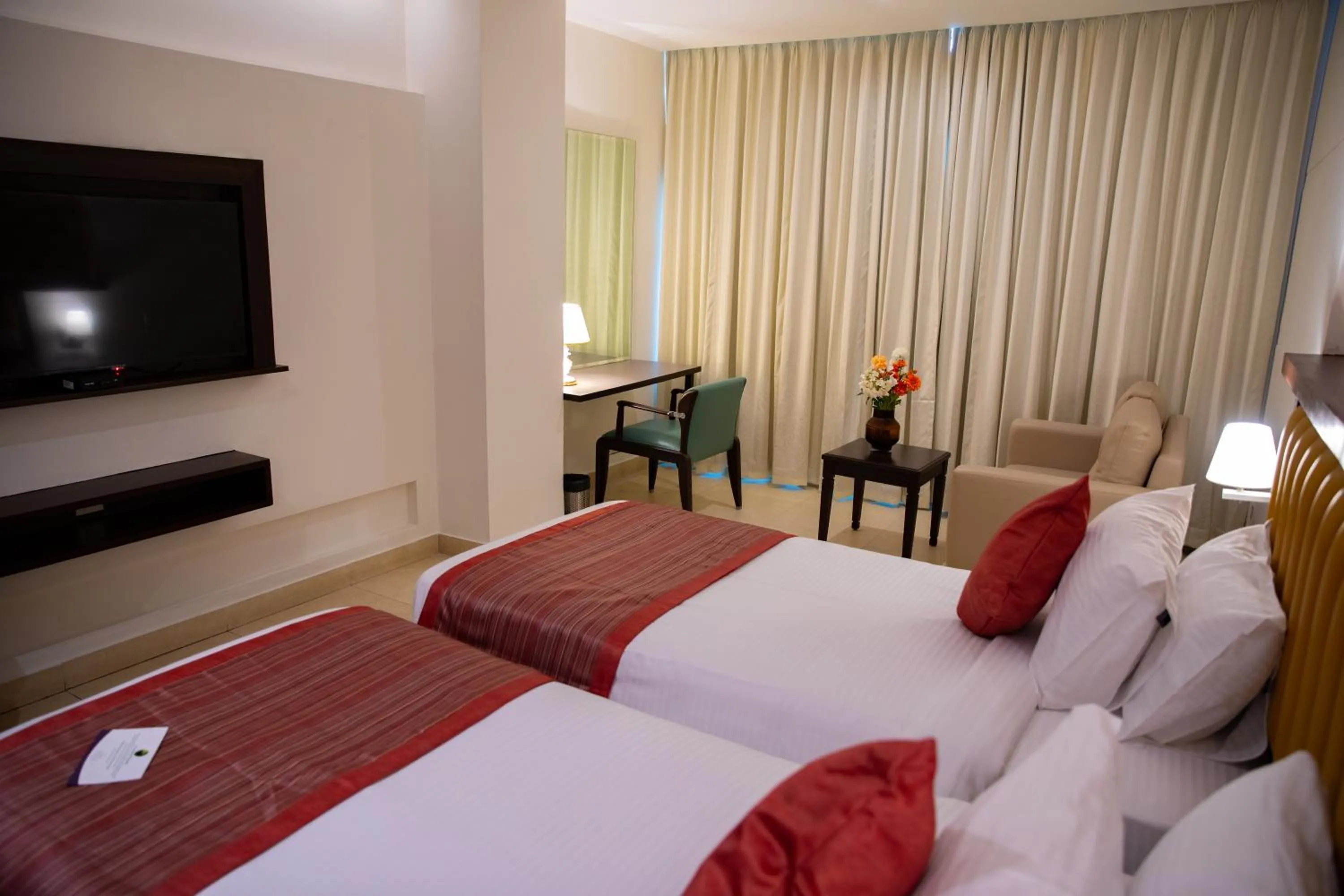 Bedroom, Bed in Grand Continent Secunderabad A Sarovar Portico Affiliate Hotel