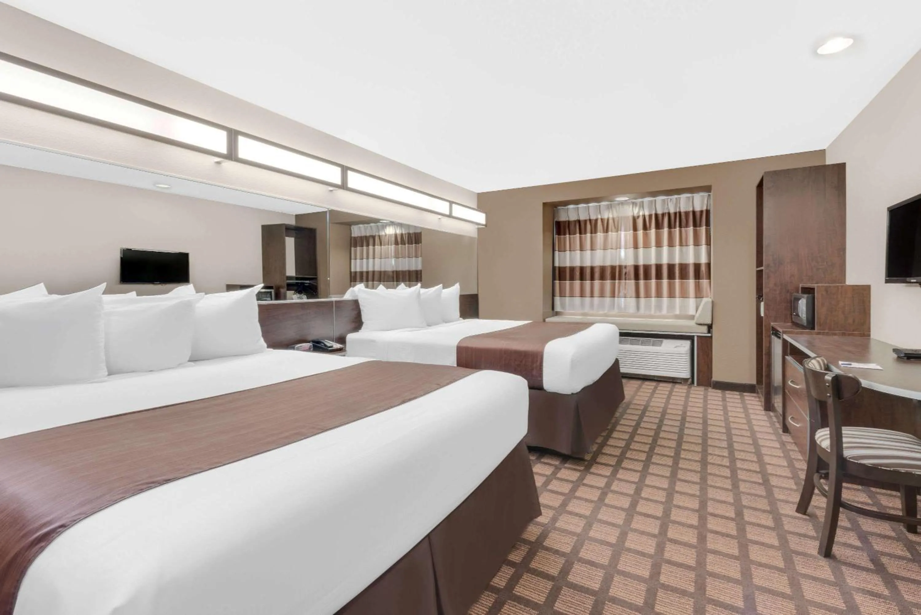 Photo of the whole room, Bed in Microtel Inn & Suites by Wyndham