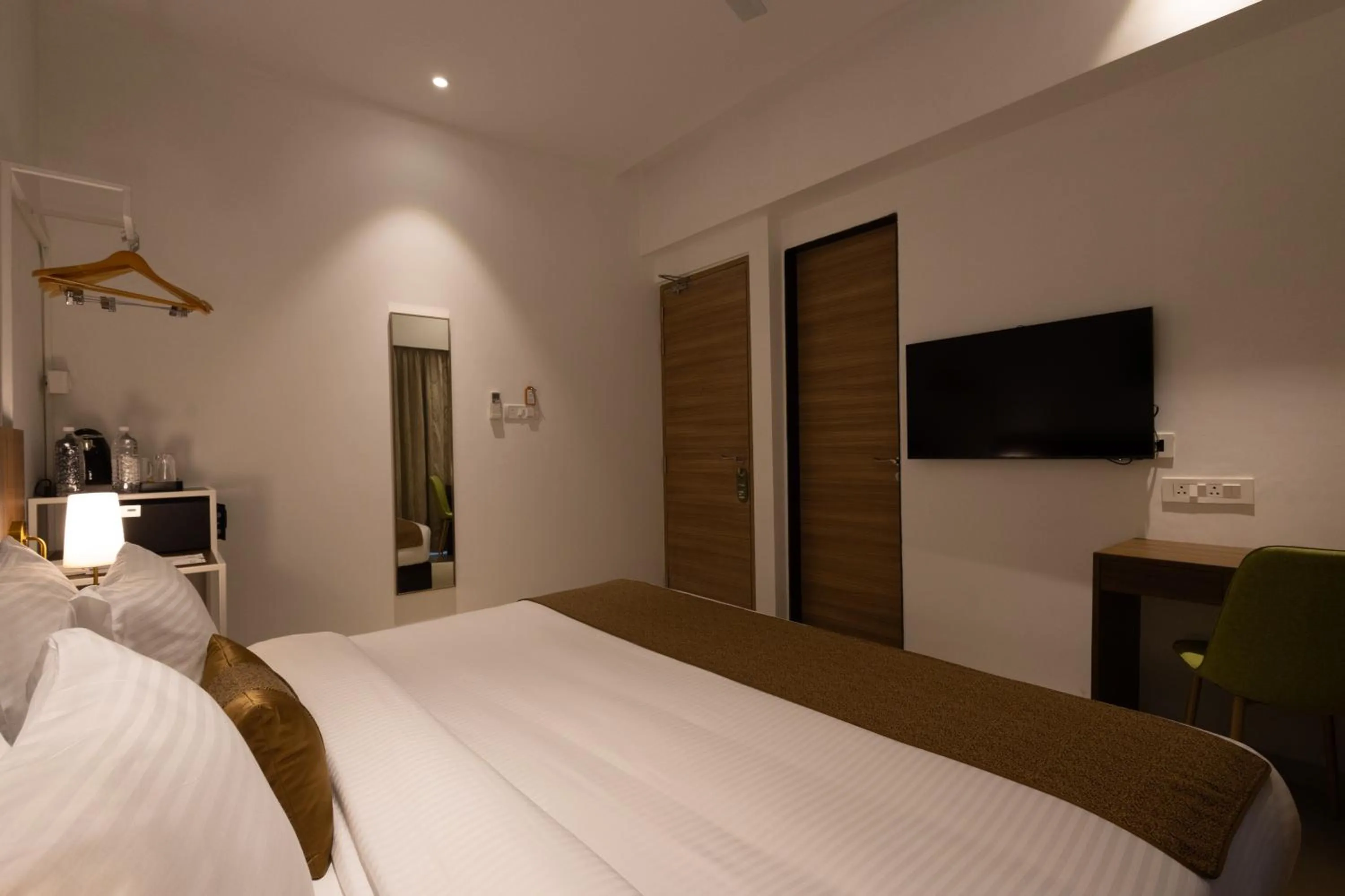 Bedroom, Bed in Freesia Residency By Express Inn - Navi Mumbai